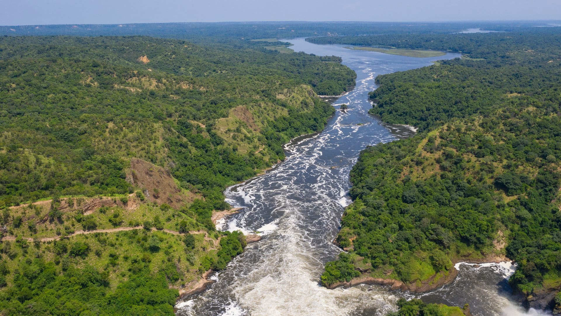 Murchison Falls (also known as Kabalega Falls) at the Nile River in Uganda. The Falls are in the Murchison Falls National Park, which is one of the main tourist destinations in Uganda.