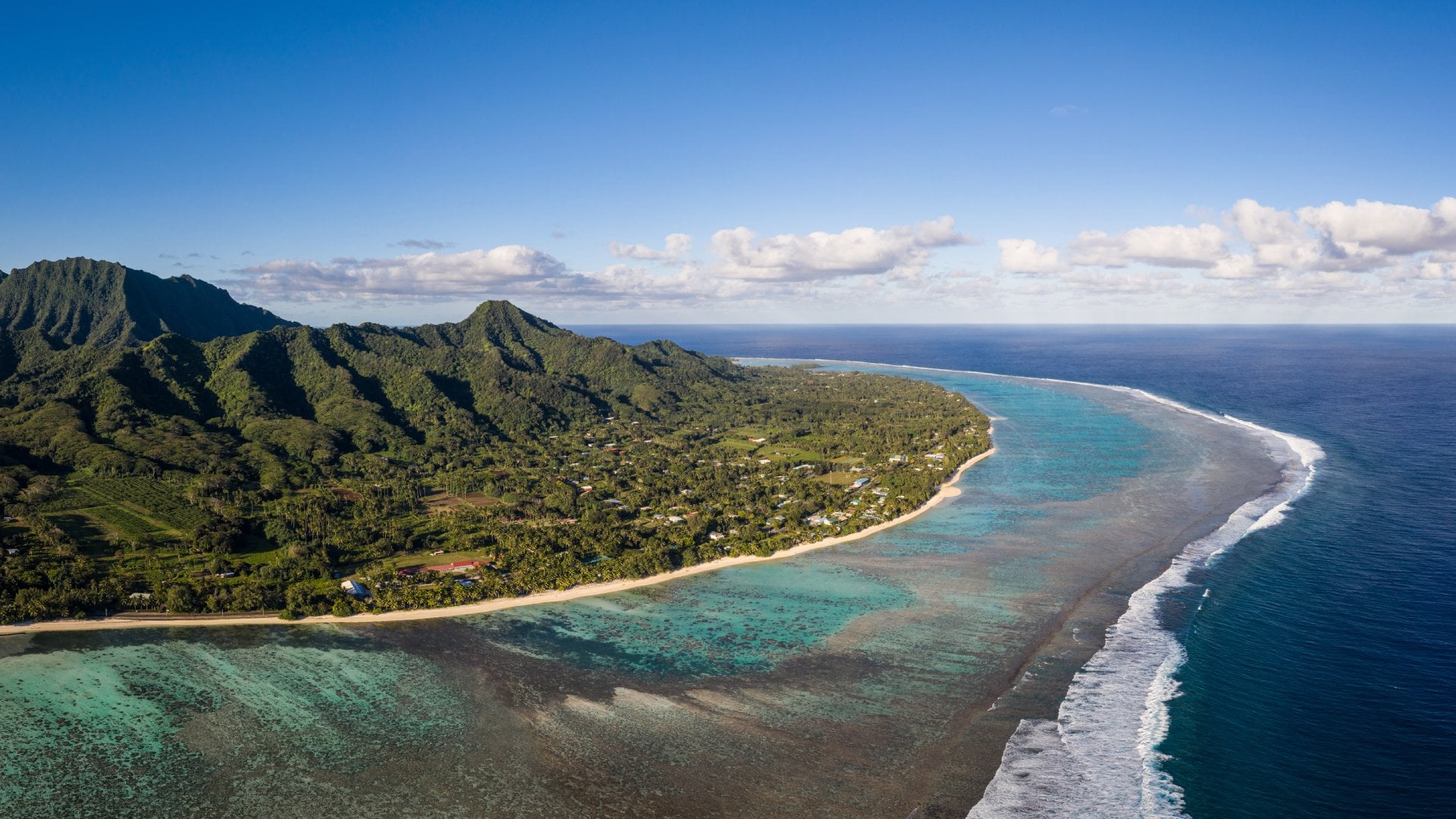 Rarotonga island, part of the Cook islands, in the Pacific ocean, with its jungle covered mountain and stunning beach