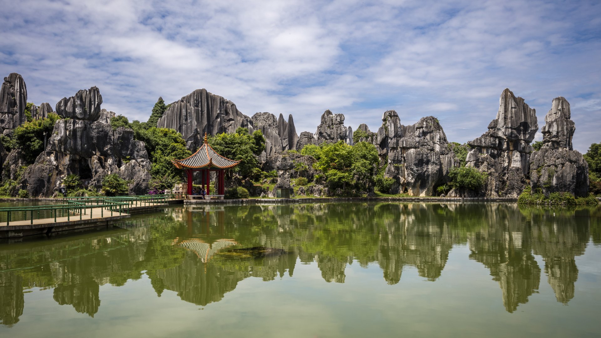 Yunnan Province The Stone Forest or Shilin is a notable set of tall limestone formations that seem to arise from the ground looking like petrified trees