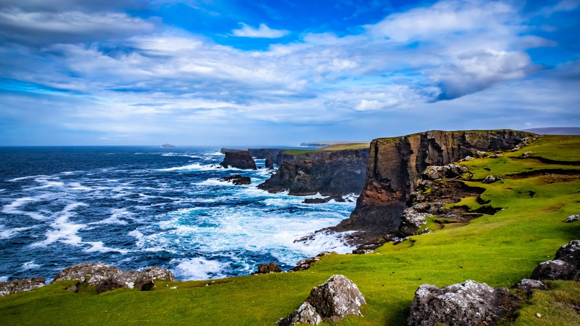 Views of archipelago cliffs and waves crashing