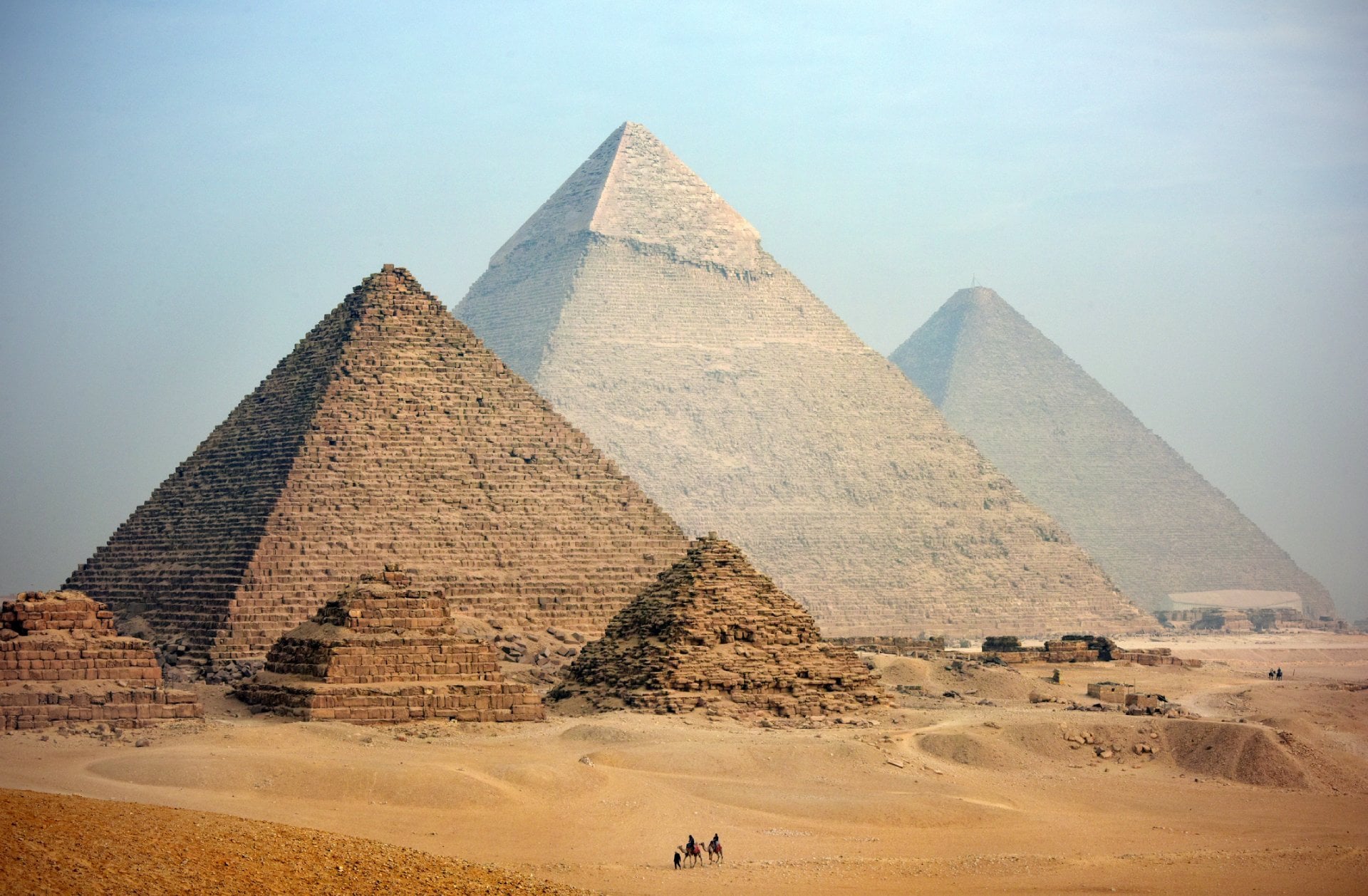 Majestic pyramids at Giza in Cairo at dusk.