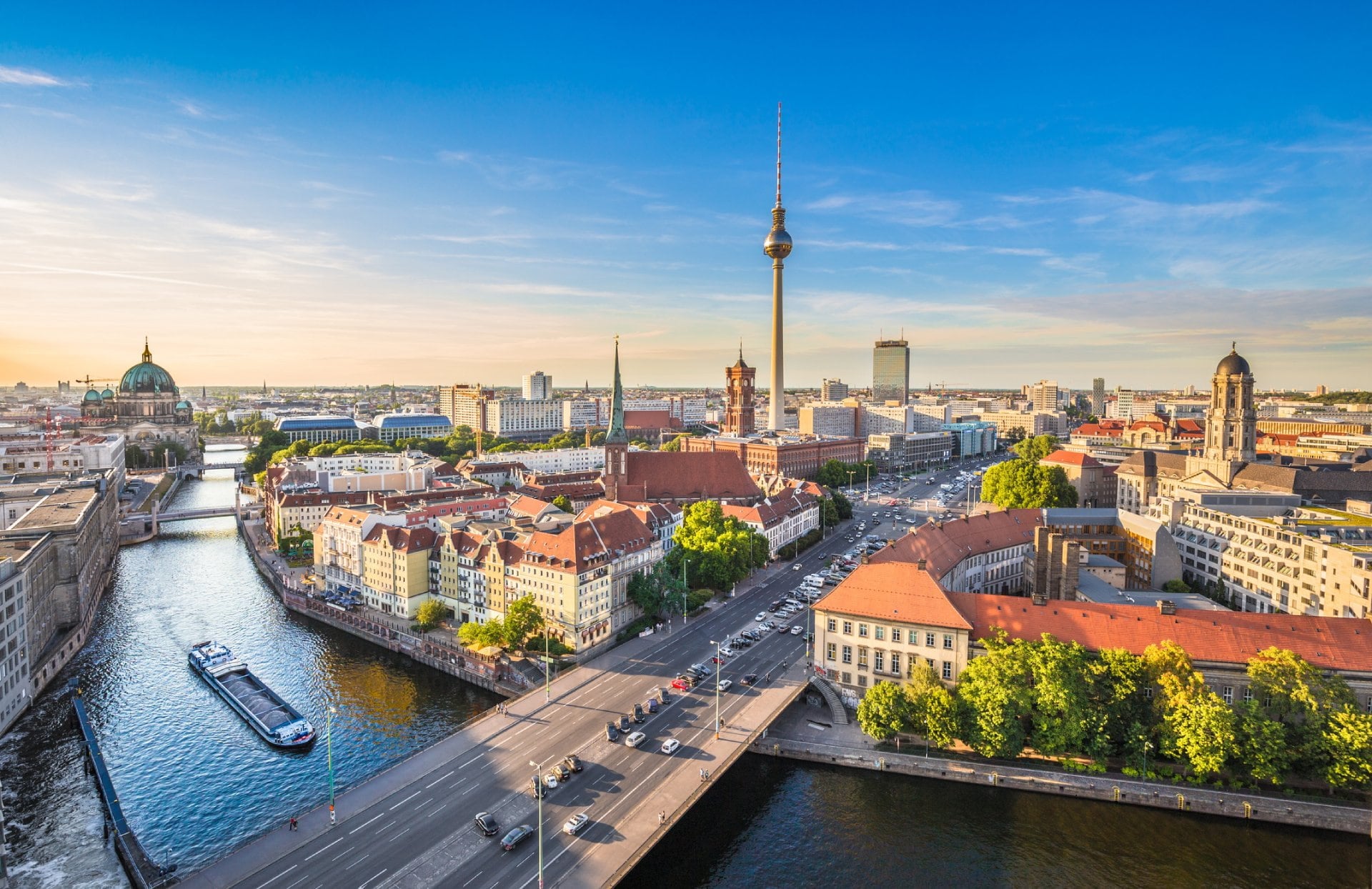 Berlin skyline with Spree river at sunset.