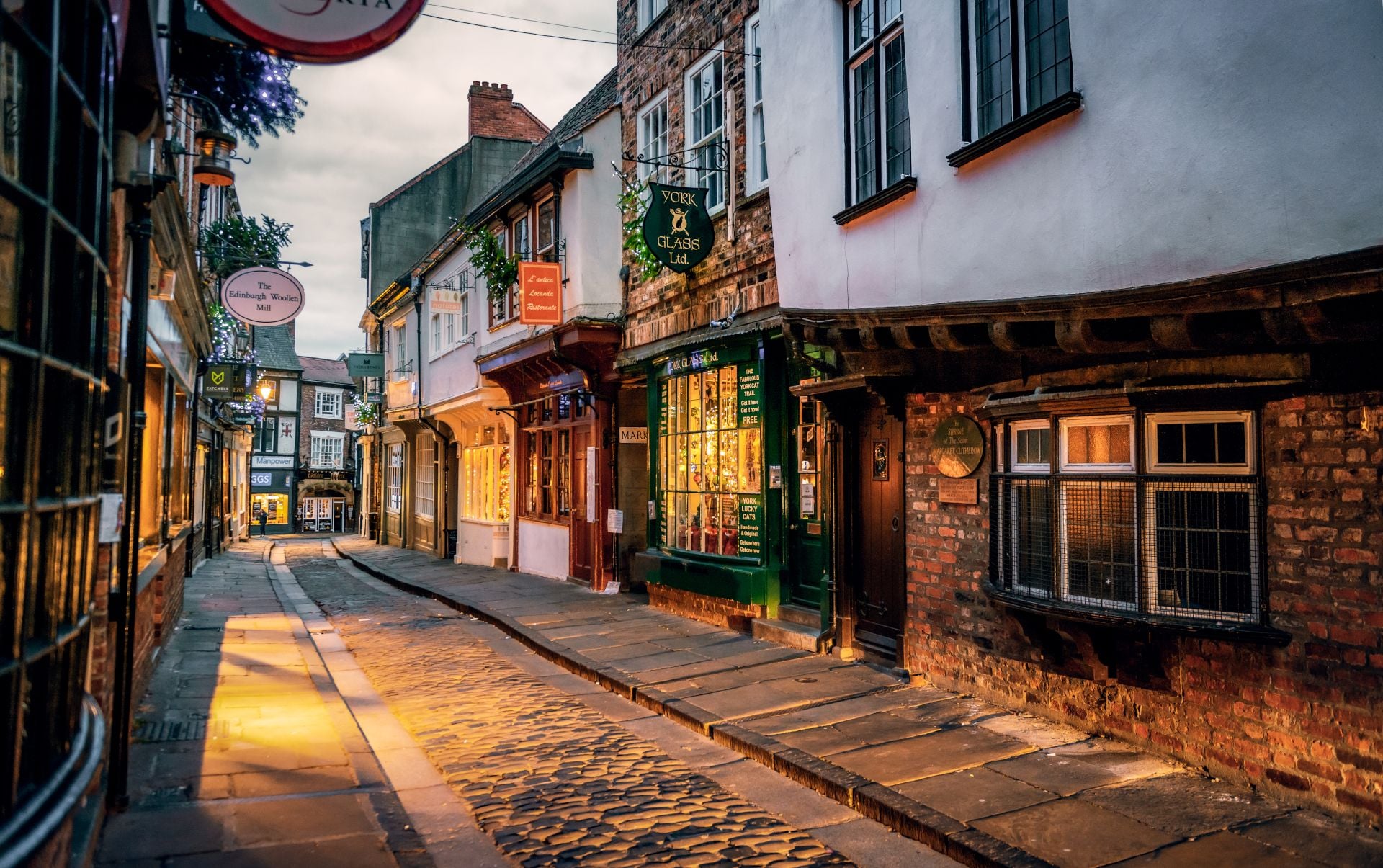 The Shambles, a medieval street preserved in the heart of the English city of York, still busy with boutique shops and cafes