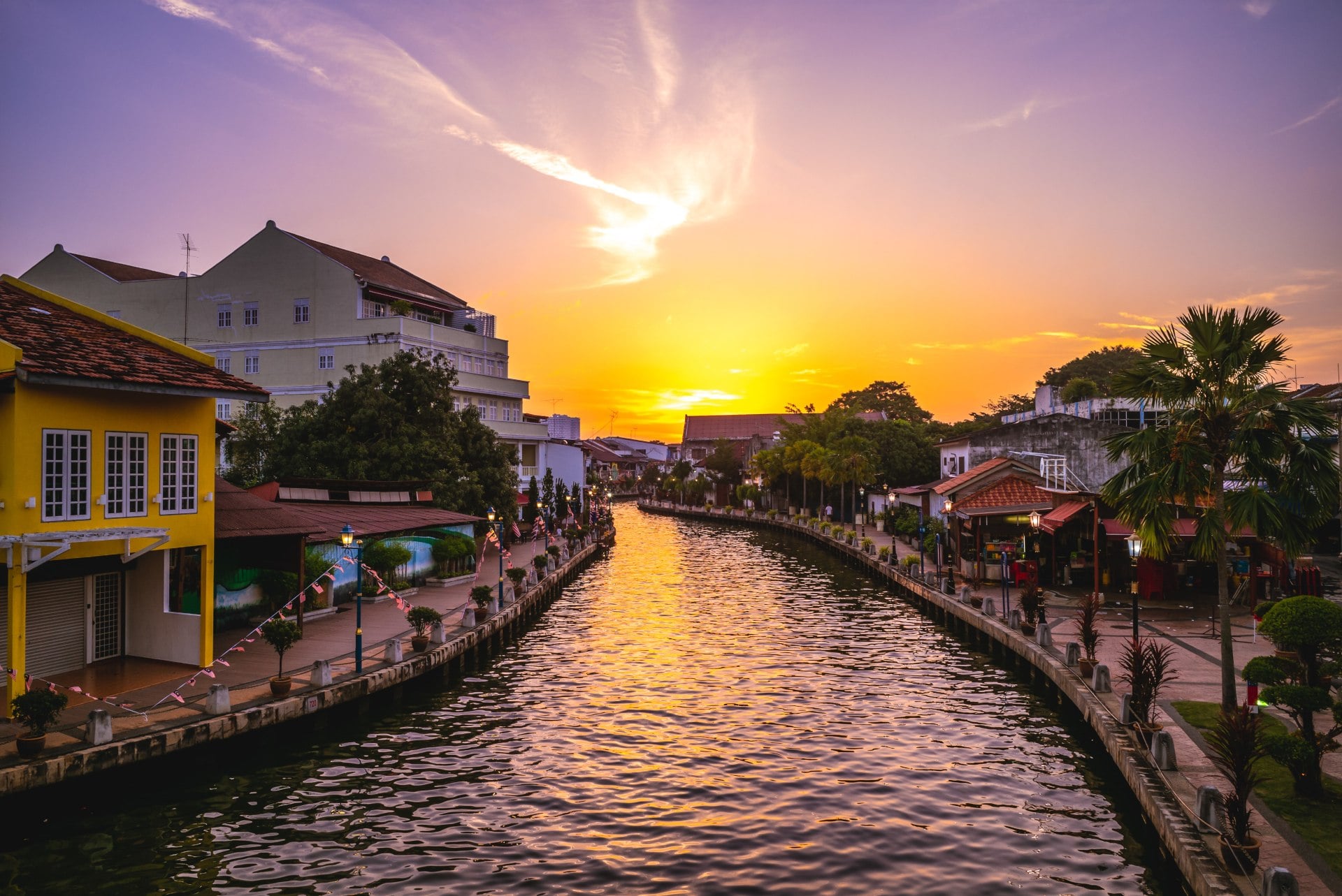 Melaka Tengah District River canal and the old town in Melaka, or Malacca, Malaysia at dusk