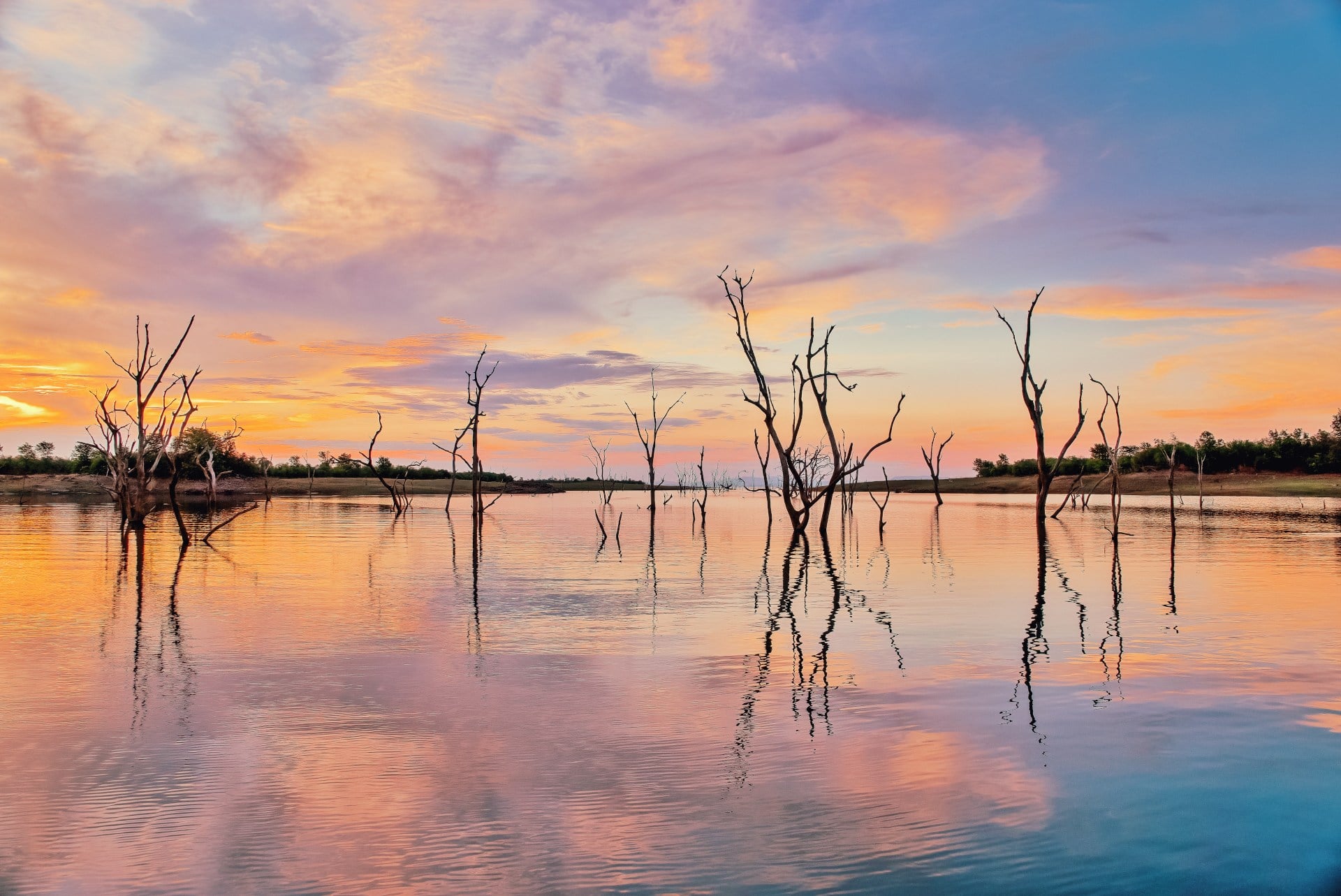 Lake Kariba is a man made lake, 226 km long and 40 km wide, located on the border between Zambia and Zimbabwe.