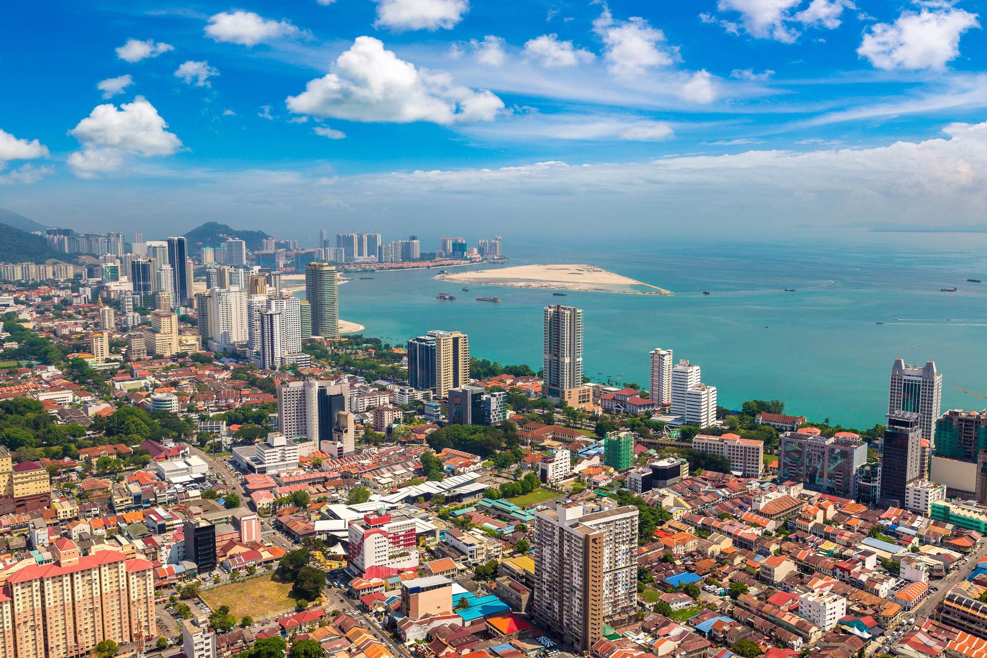 Panoramic aerial view of the city of Georgetown, with the straits of Malacca and Indian Ocean in the background