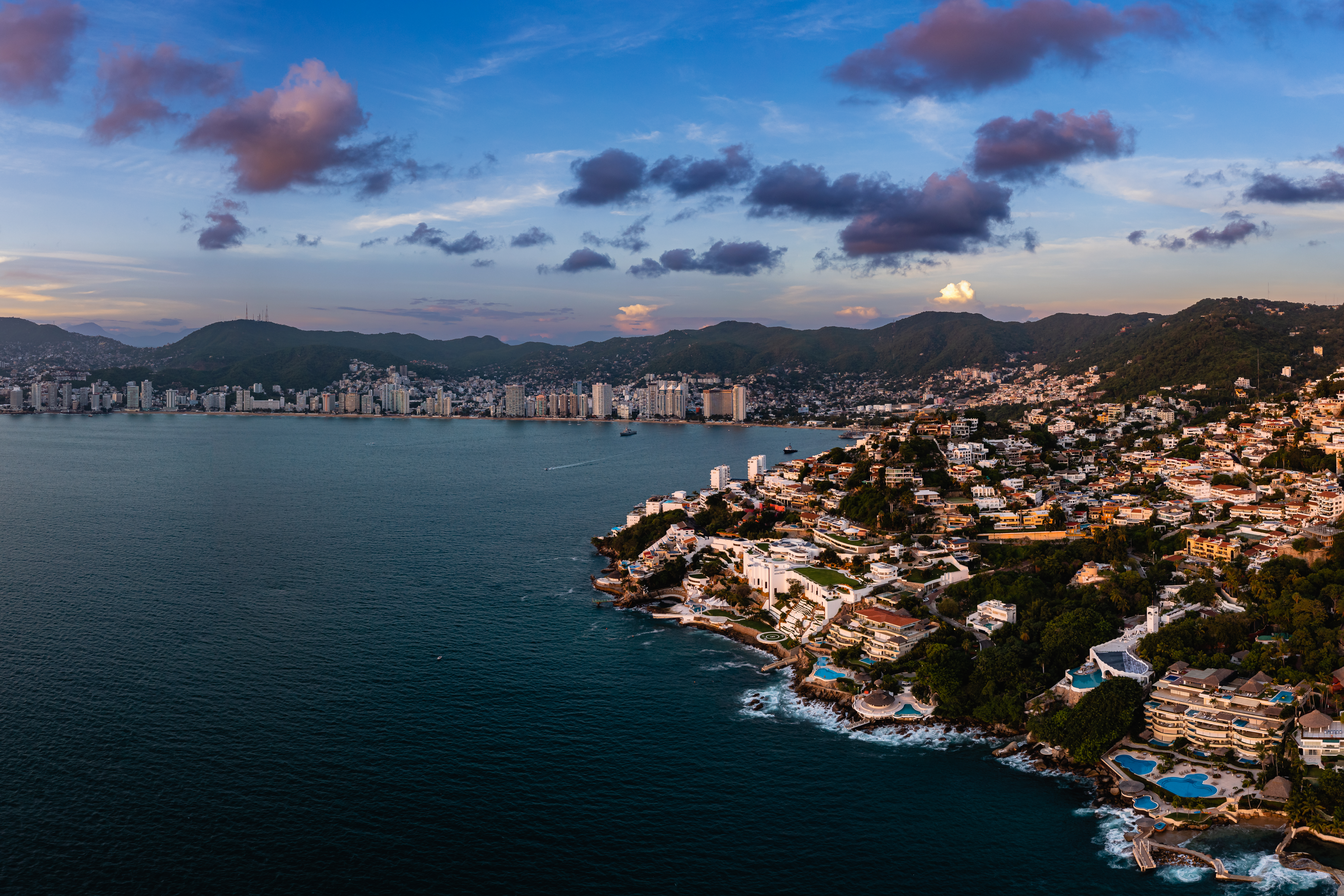 Aerial view of the sunset in the Bay of Acapulco from the Las Brisas area