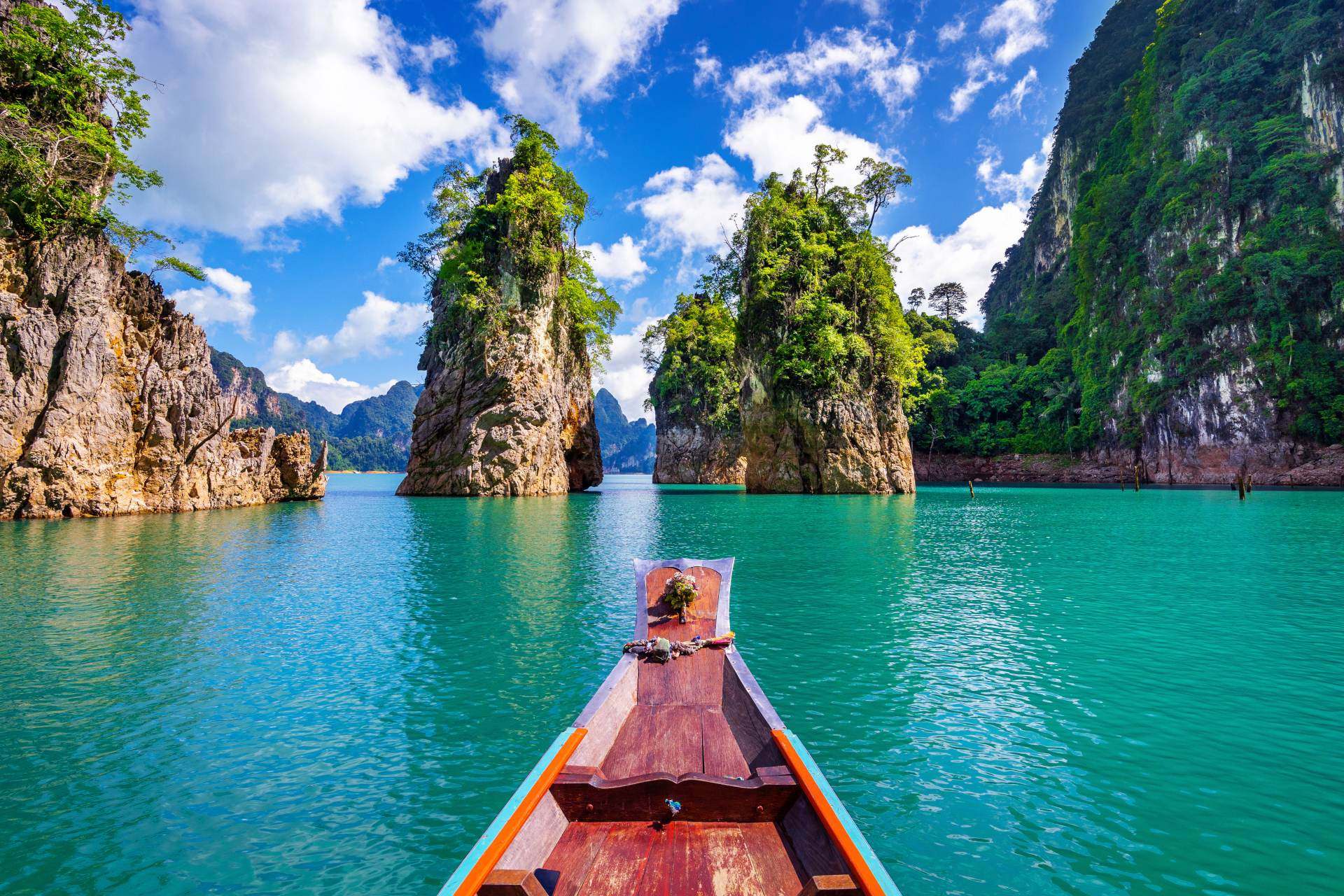 Mountains and view from aboard a boat on the Phrasaeng river
