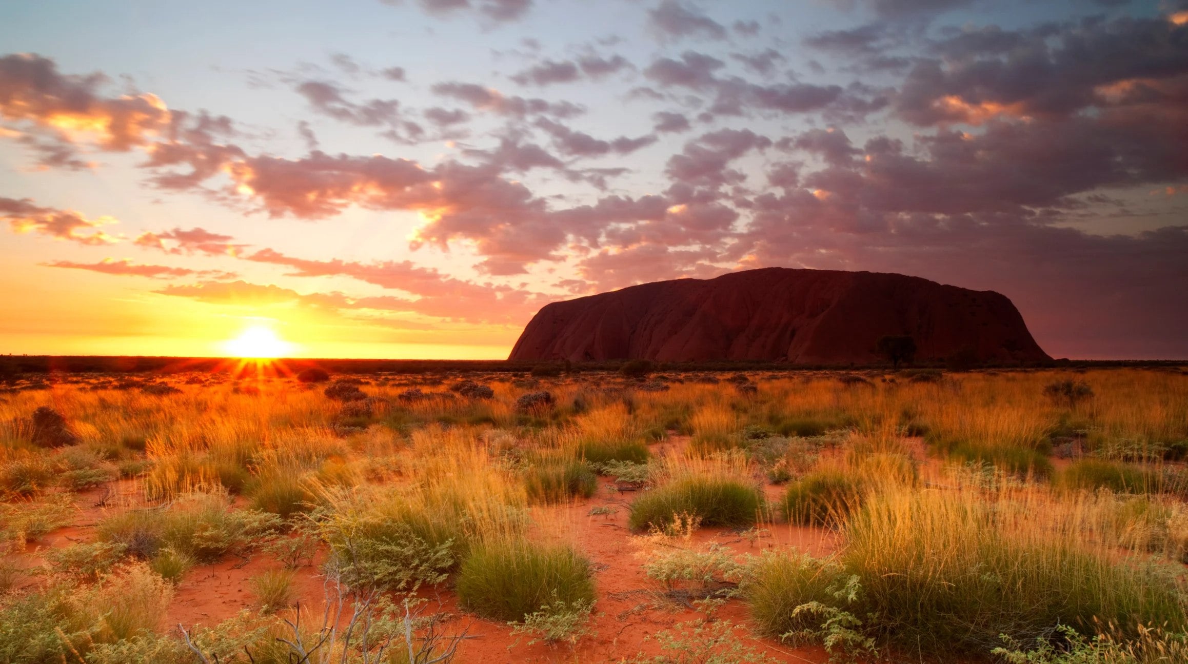 Uluru, the Australian landmark, at sunset