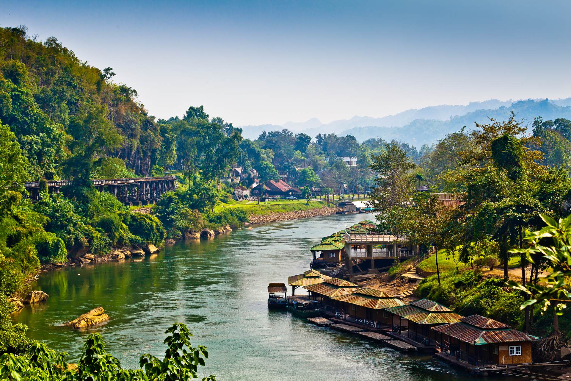 River winds between rural villages