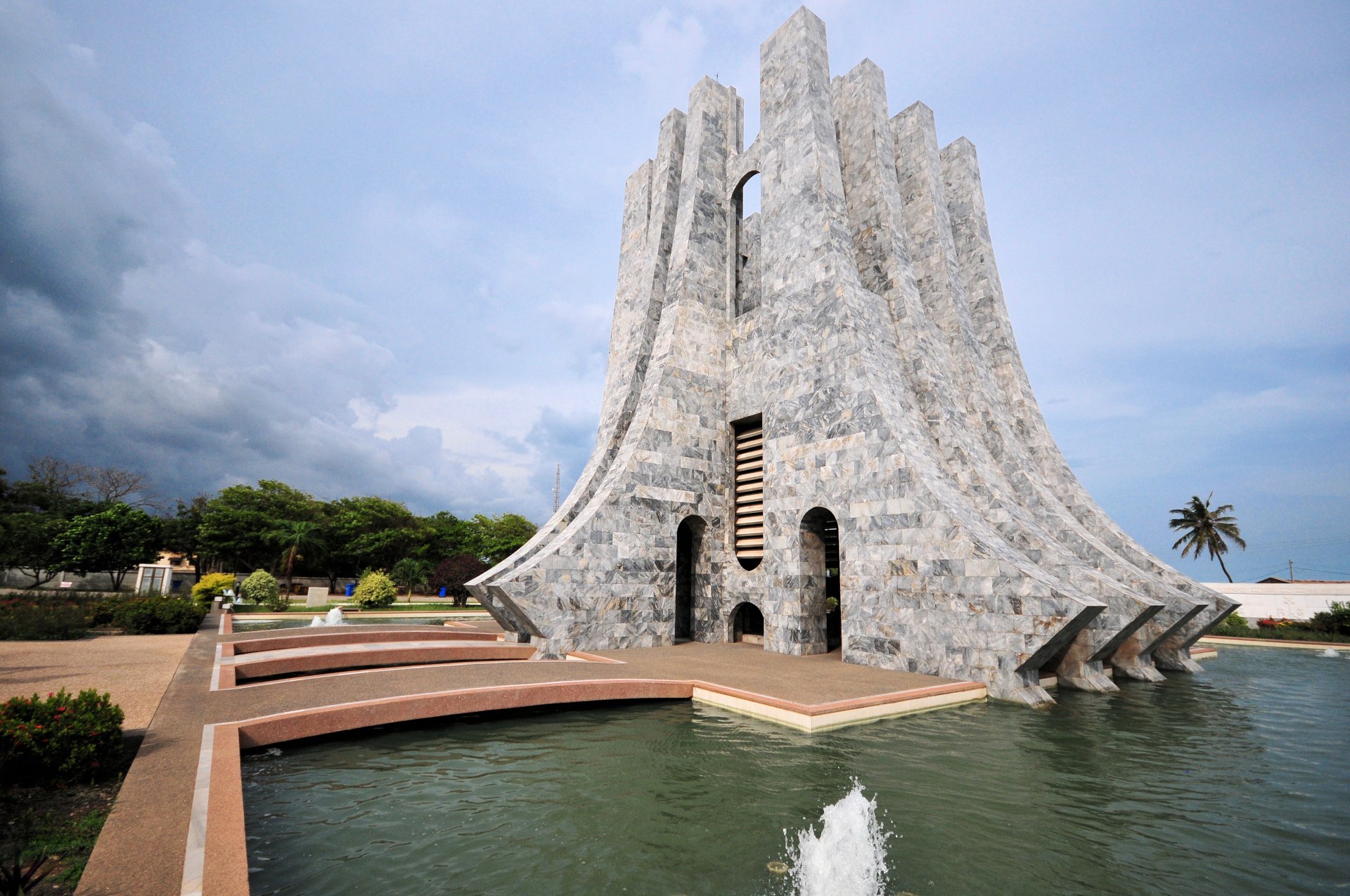 Cental building surrounded by water at Kwame Nkrumah Park - named after the founding father of Ghana, built on a former British polo field - High street