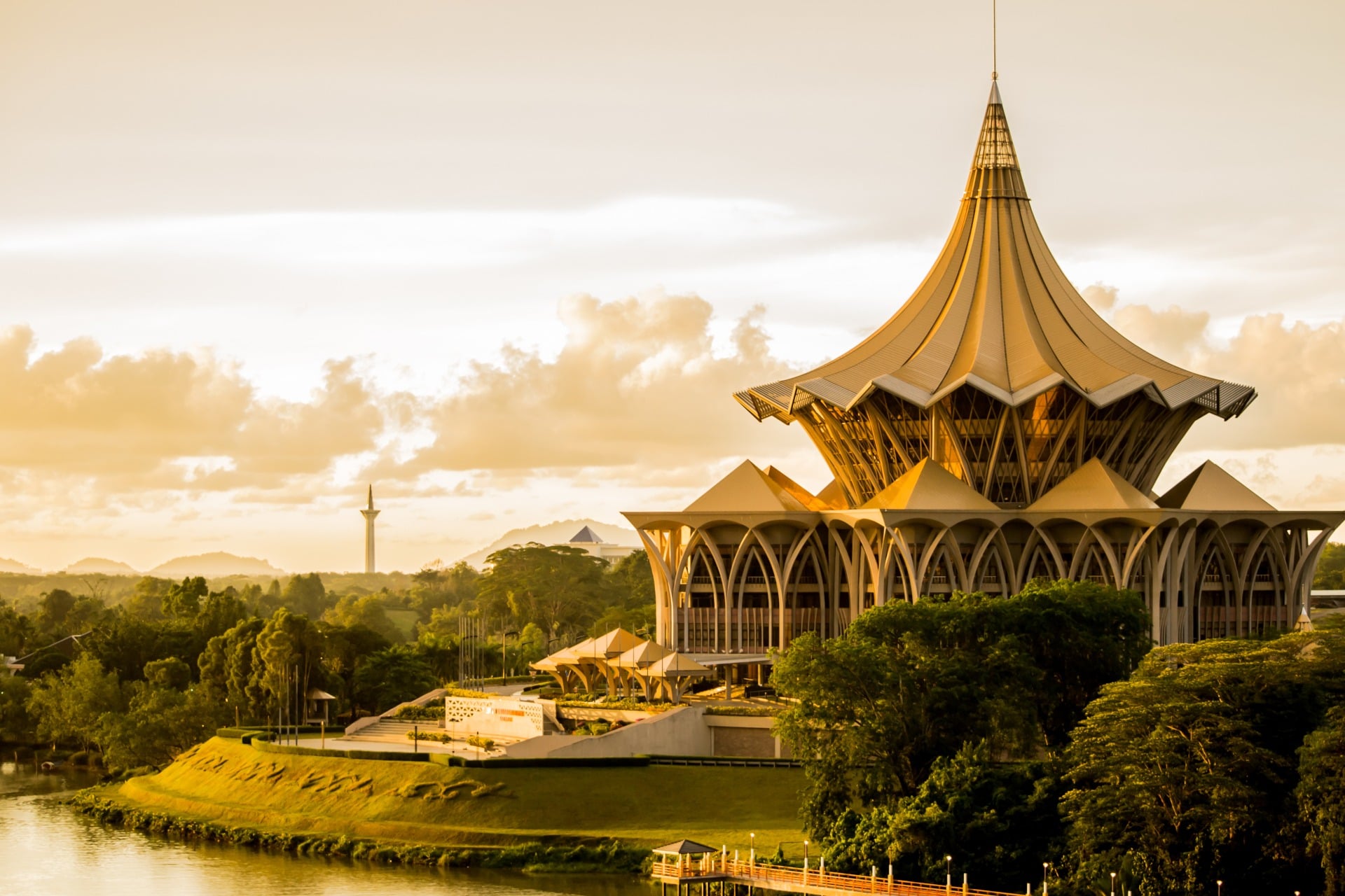 Sarawak River New Sarawak State Legislative Assembly Building at bank of Sarawak river in Kuching during sunset