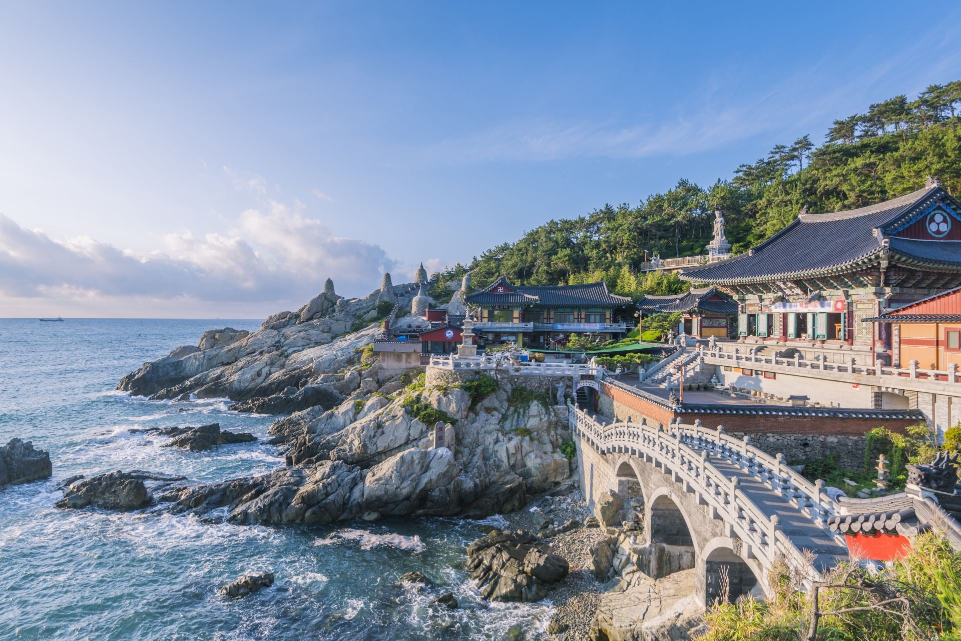 Haedong Yonggungsa Temple is situated on the edge of the rocky coast of the sea
