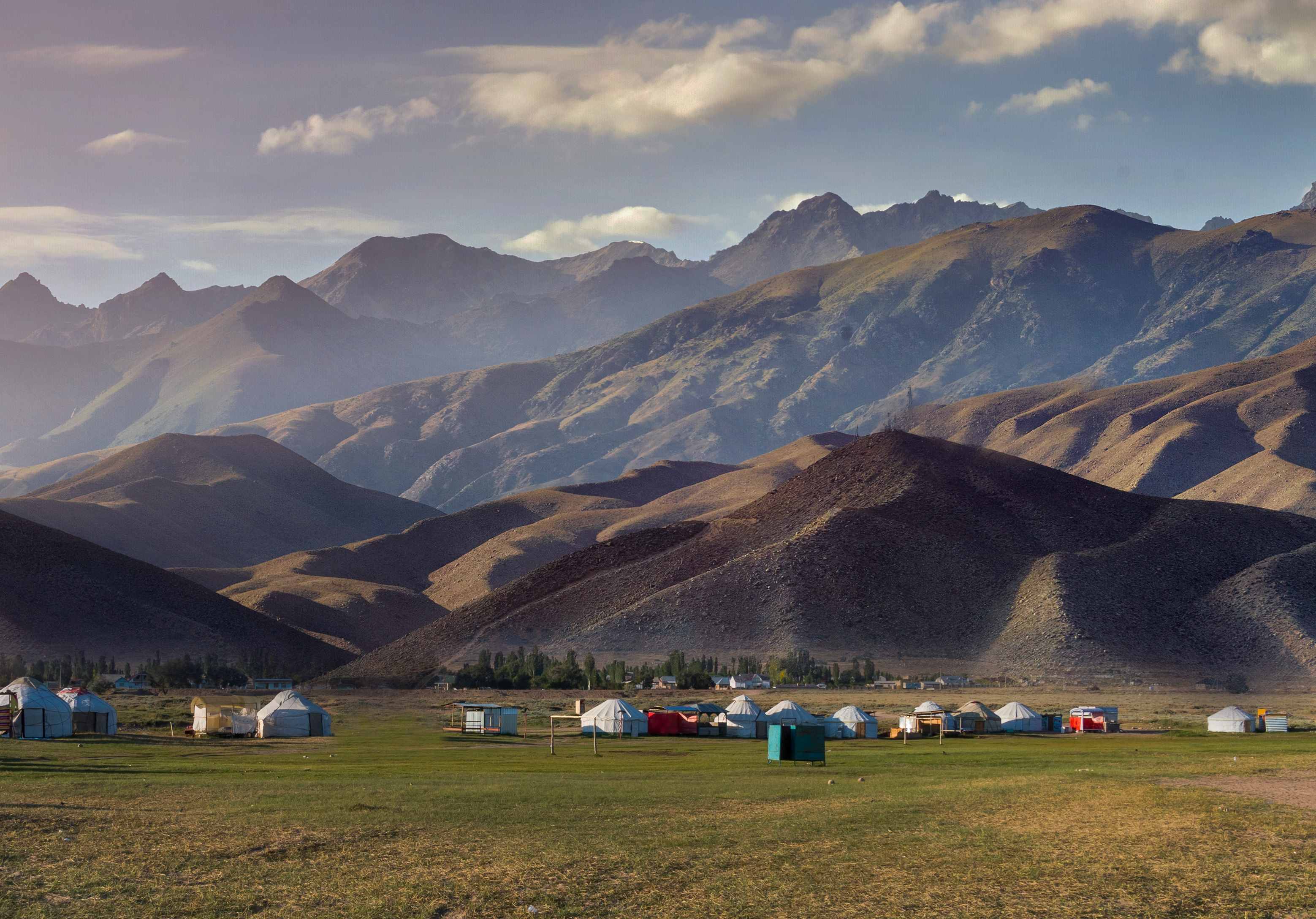 Ile-Alatau National Park Mountain landscape with yurts in foreground, in Kazakhstan near Almaty