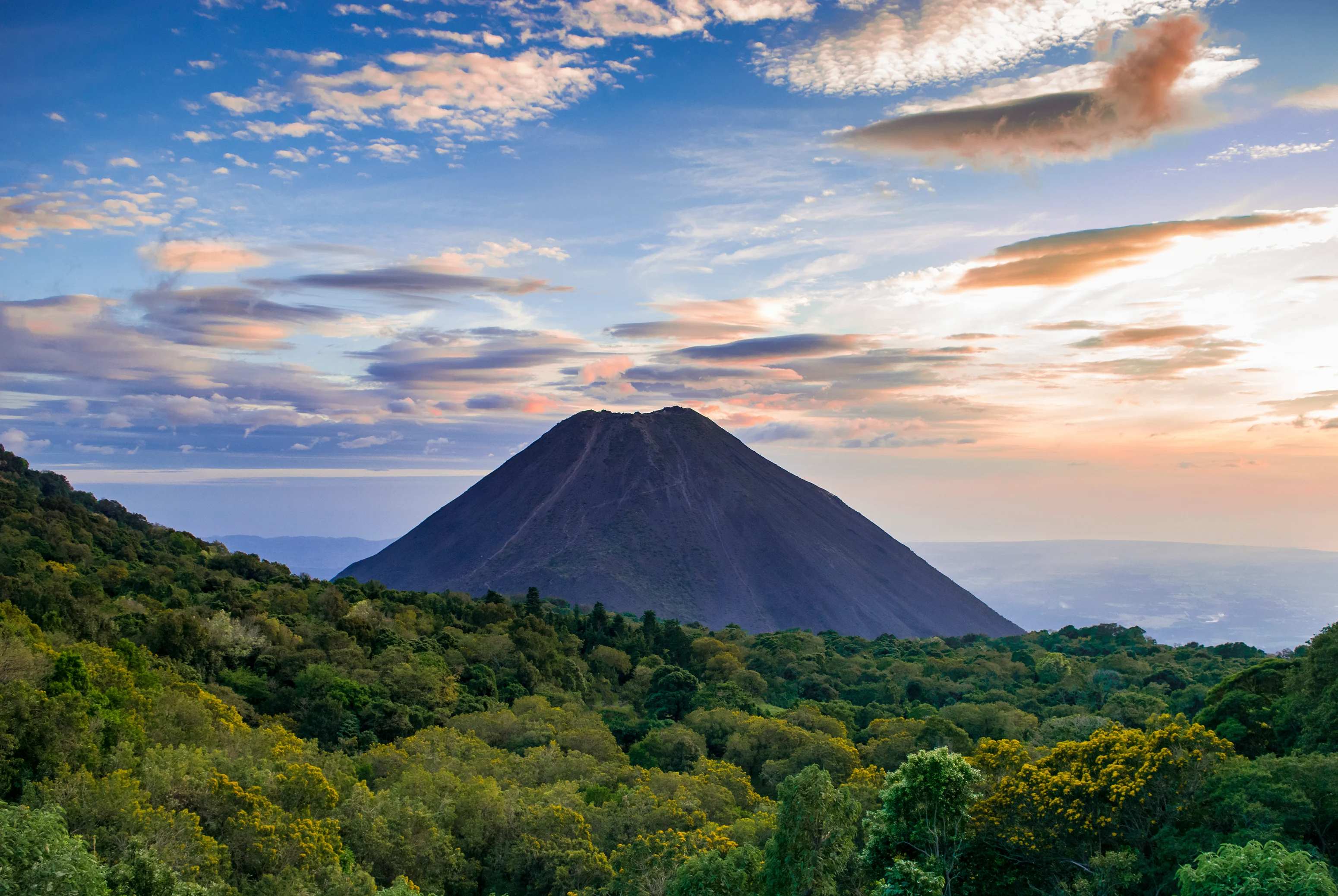 Izalco volcano rises up from the forest in El Salvador