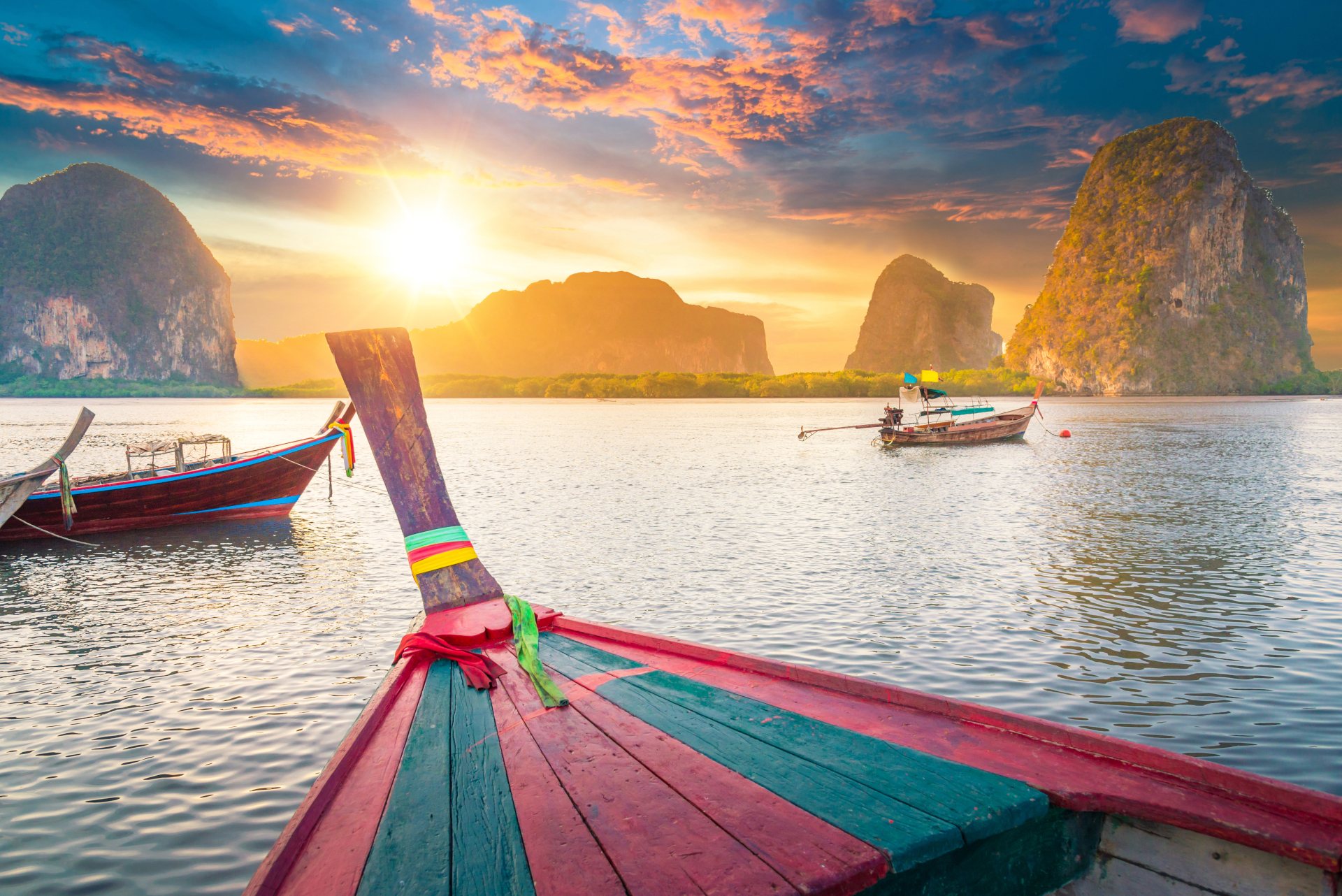 Panoramic view of colorful long tail boat floating in South Thailand stock photo
