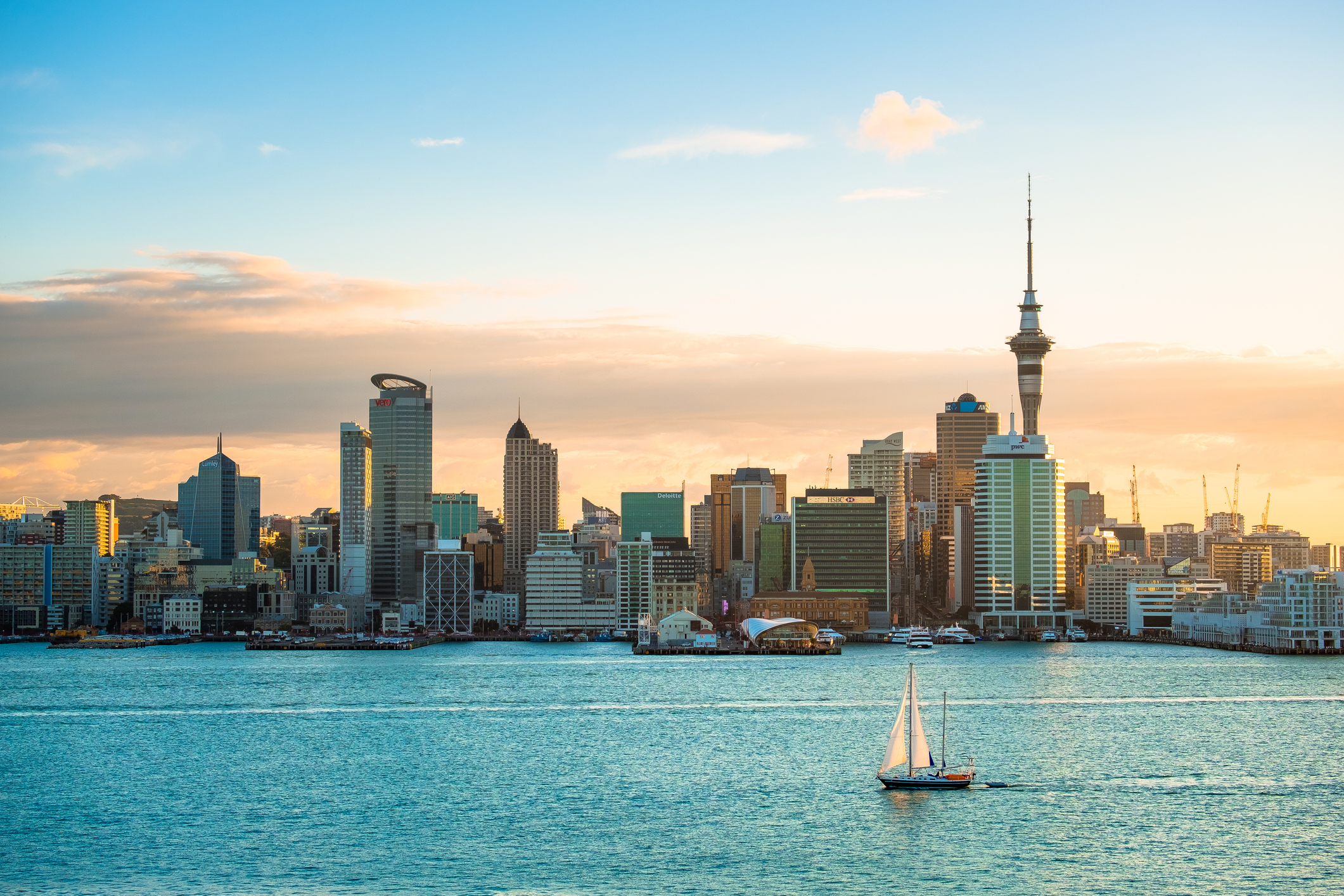 A view of Auckland Harbour in the morning with a sailboat in New Zealand.