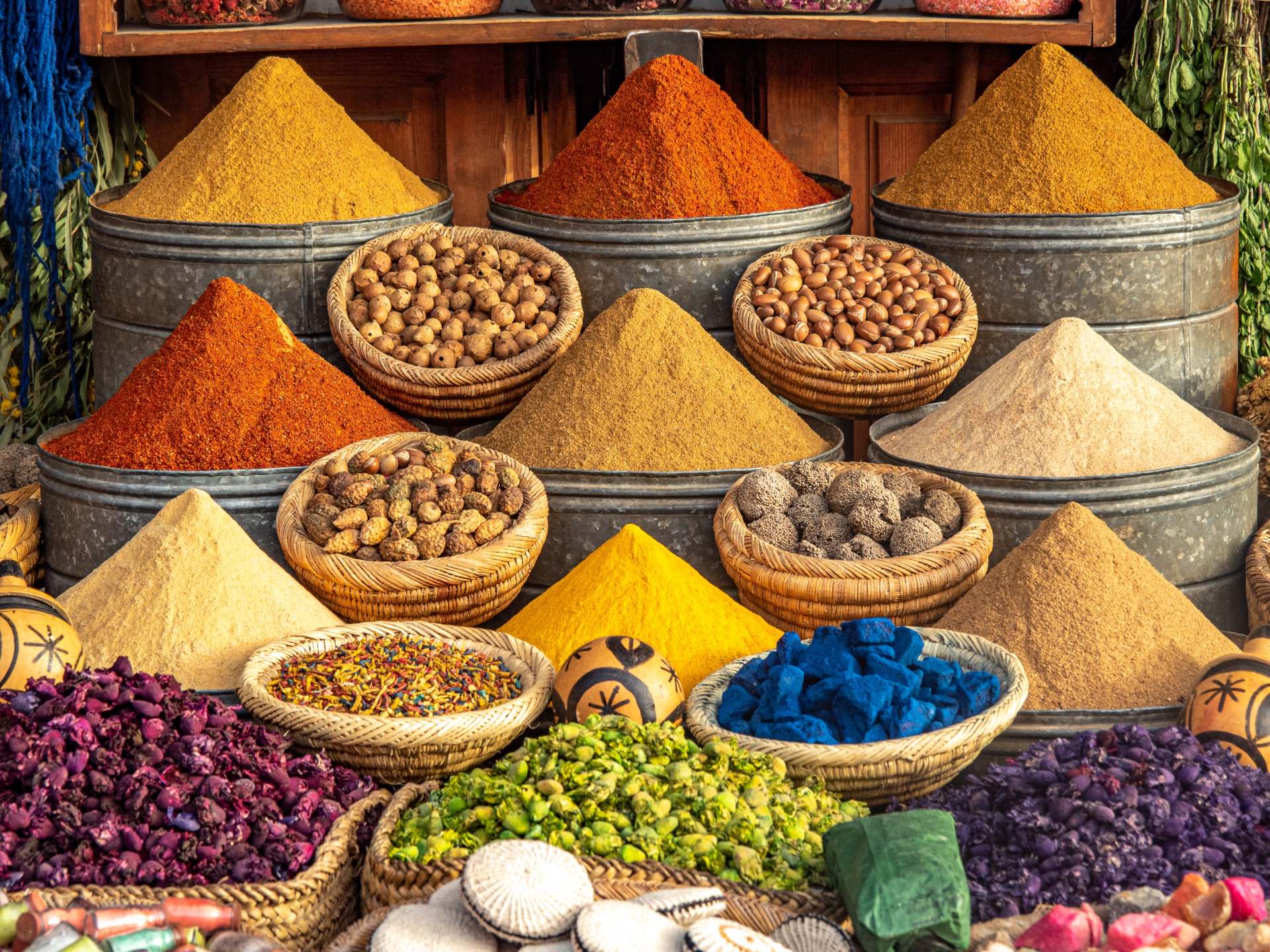 Colorful spices and dyes found at souk market in Marrakesh, Morocco.
