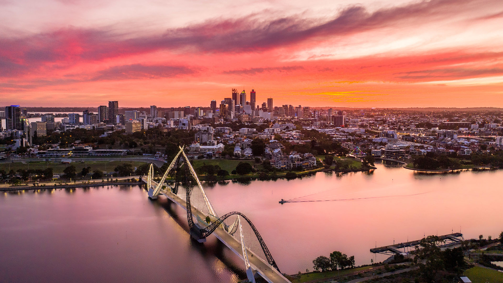 Sunset over Perth in Western Australia, with the river, bridge, and skyline