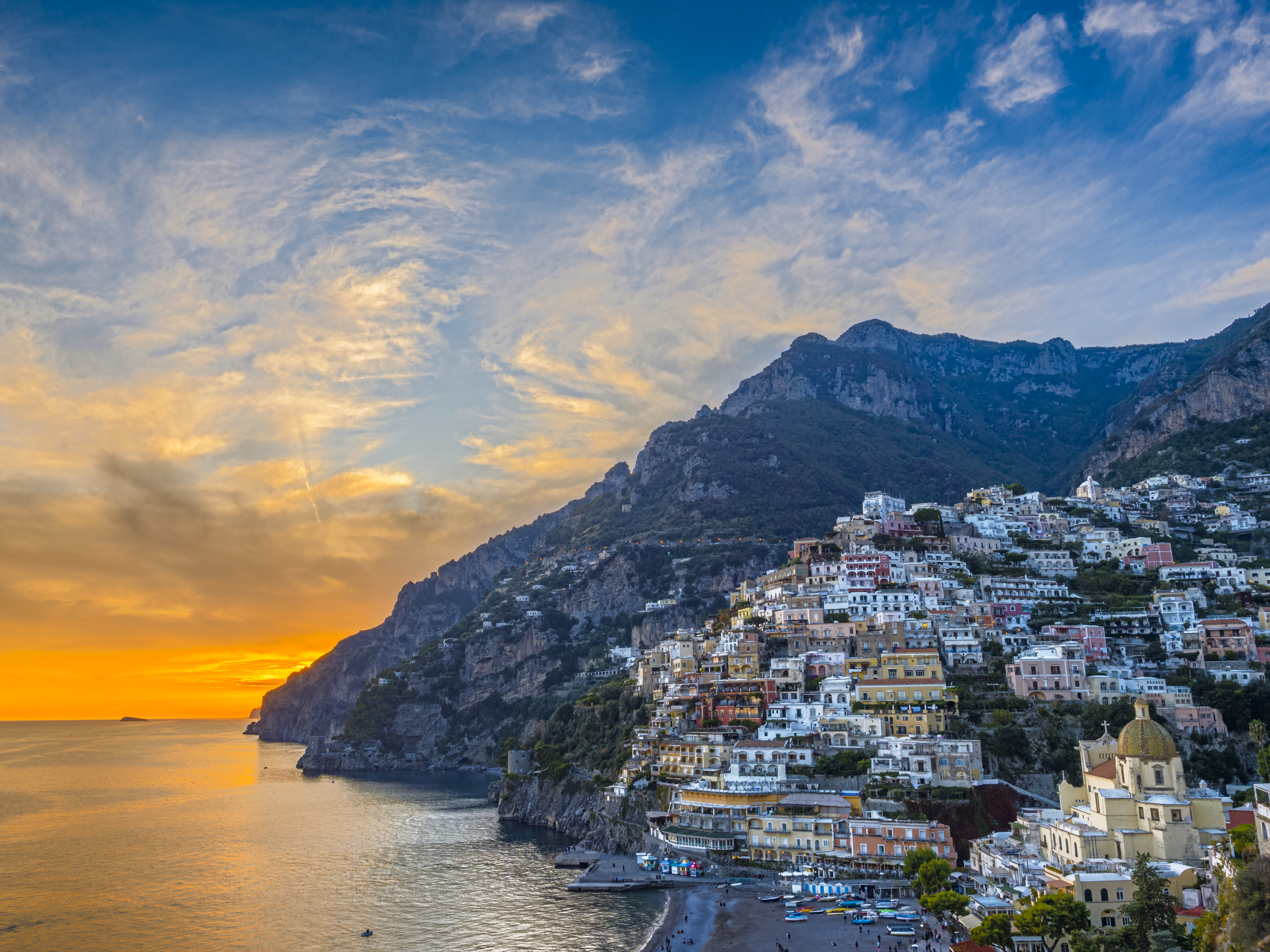 Positano, with it's pastel-hued houses clinging to the cliffside is the jewel of the A,alfi Coast