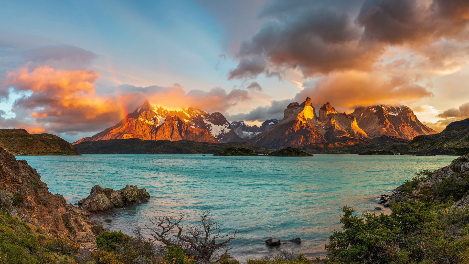 Sunrise with Rainbow in the Patagonian Andes Mountains