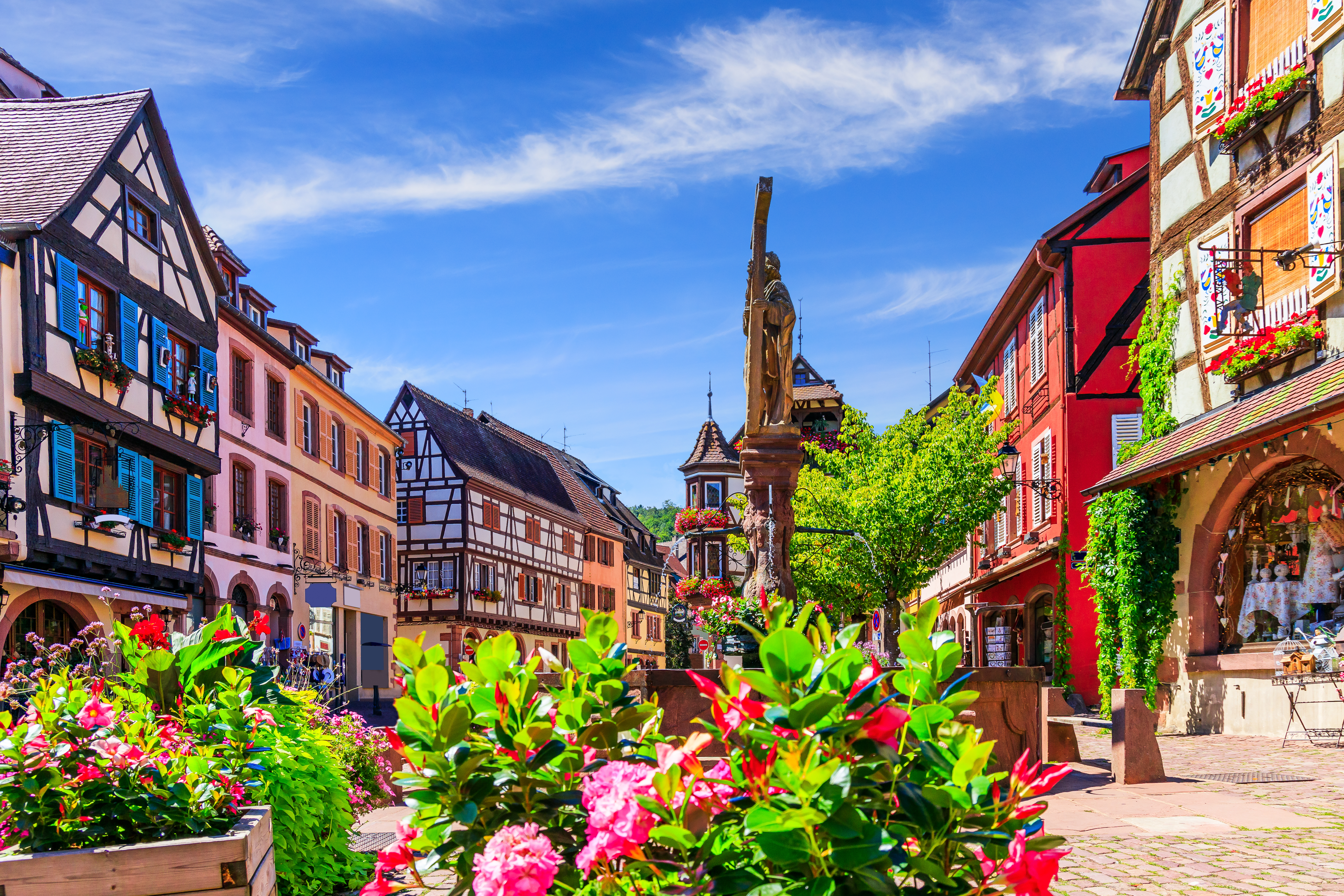 Picturesque street with traditional half timbered houses on the Alsace Wine Route.