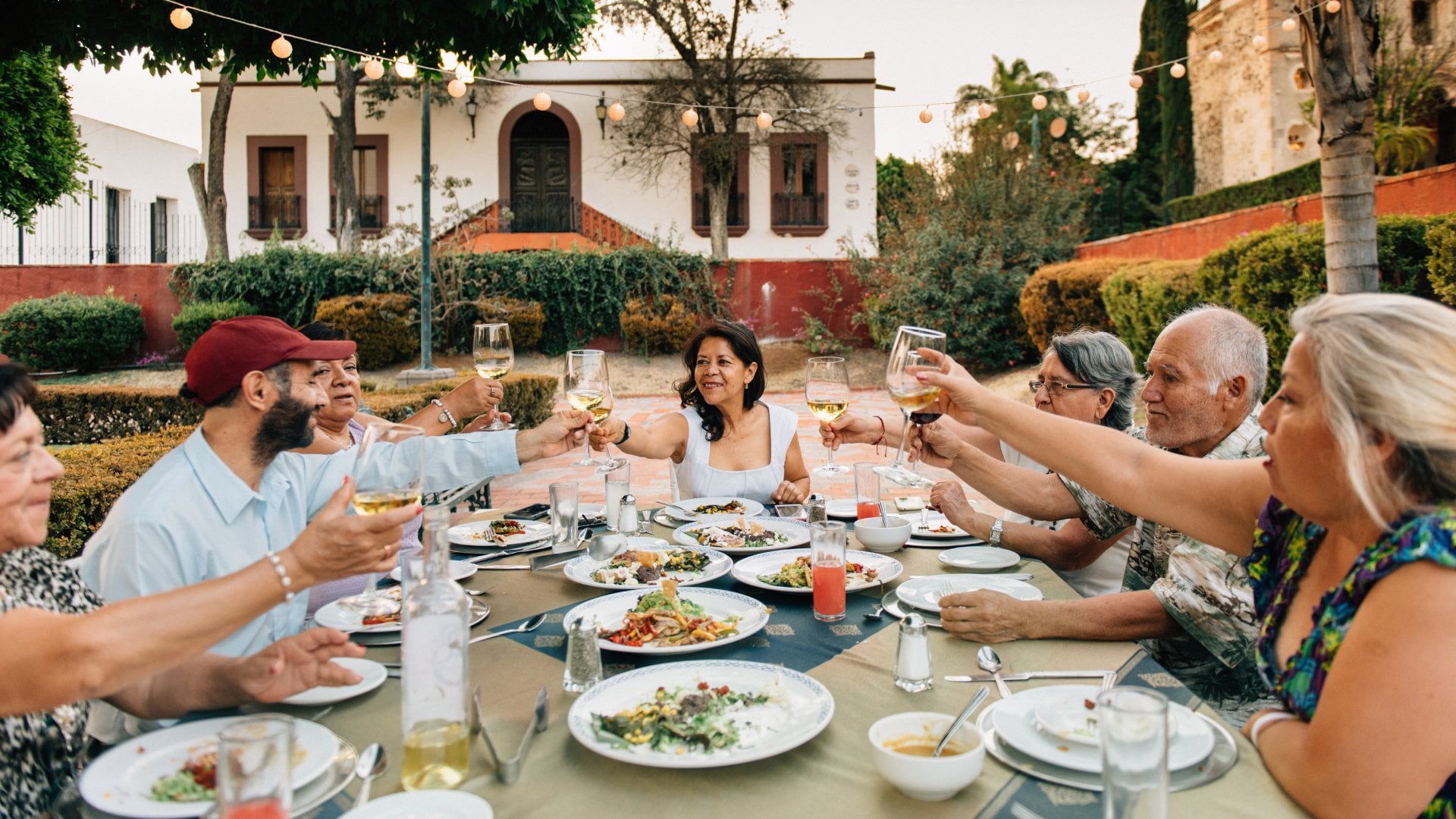 A travel group dines together