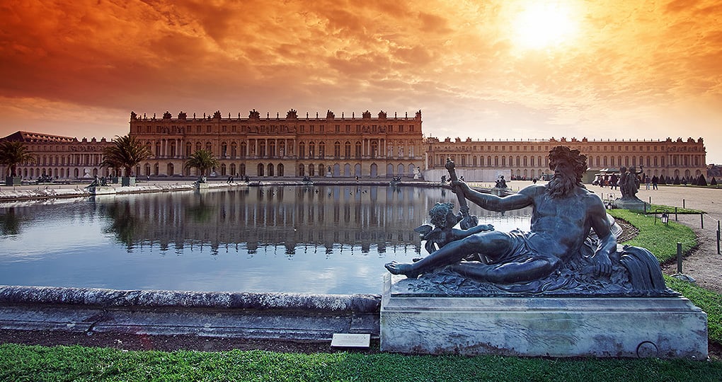 Step outside of Paris to visit royalty at the extravagant Palace of Versailles
