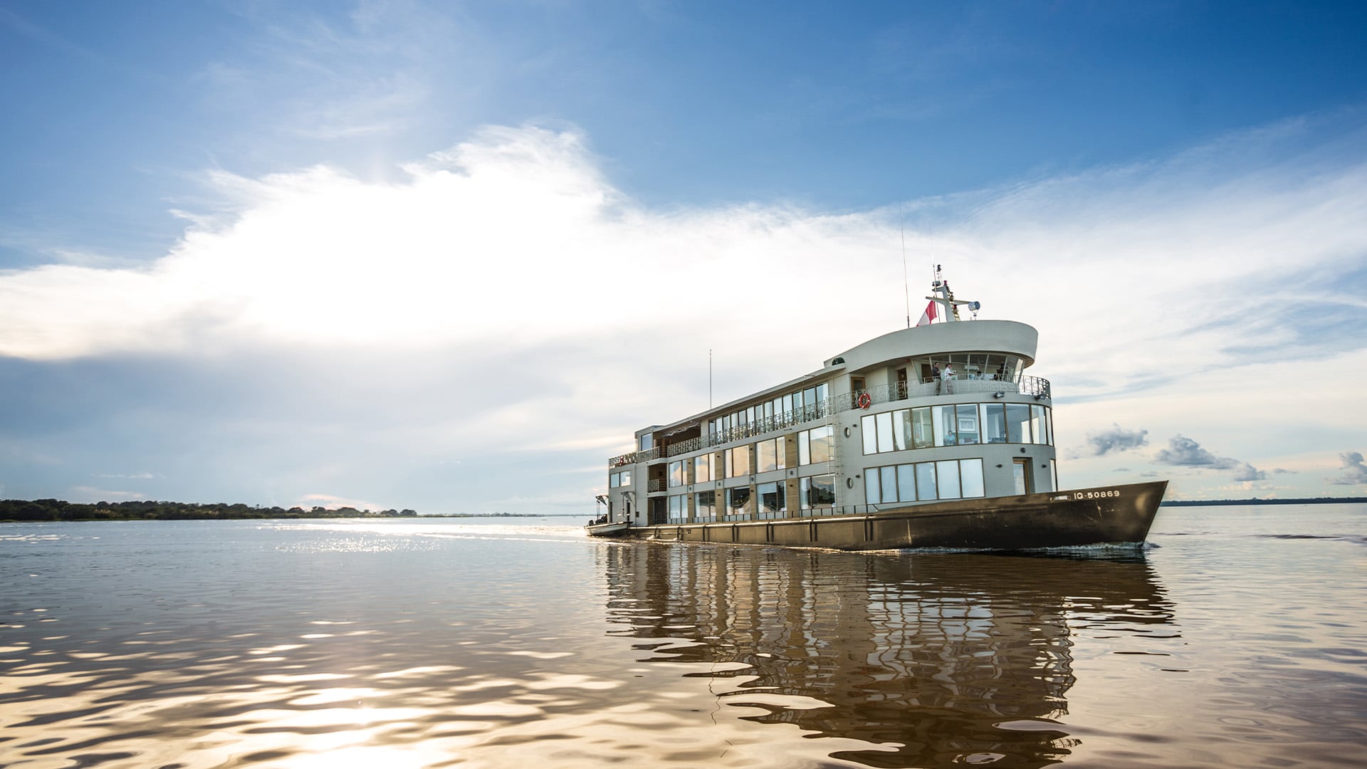 The Delfin III cruises along the Amazon River in northern Peru