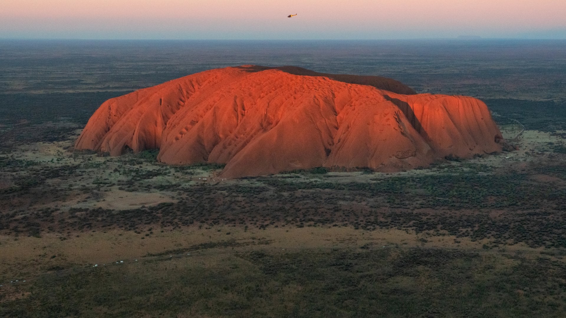 Aerial View Of Uluru In The Evening Sun