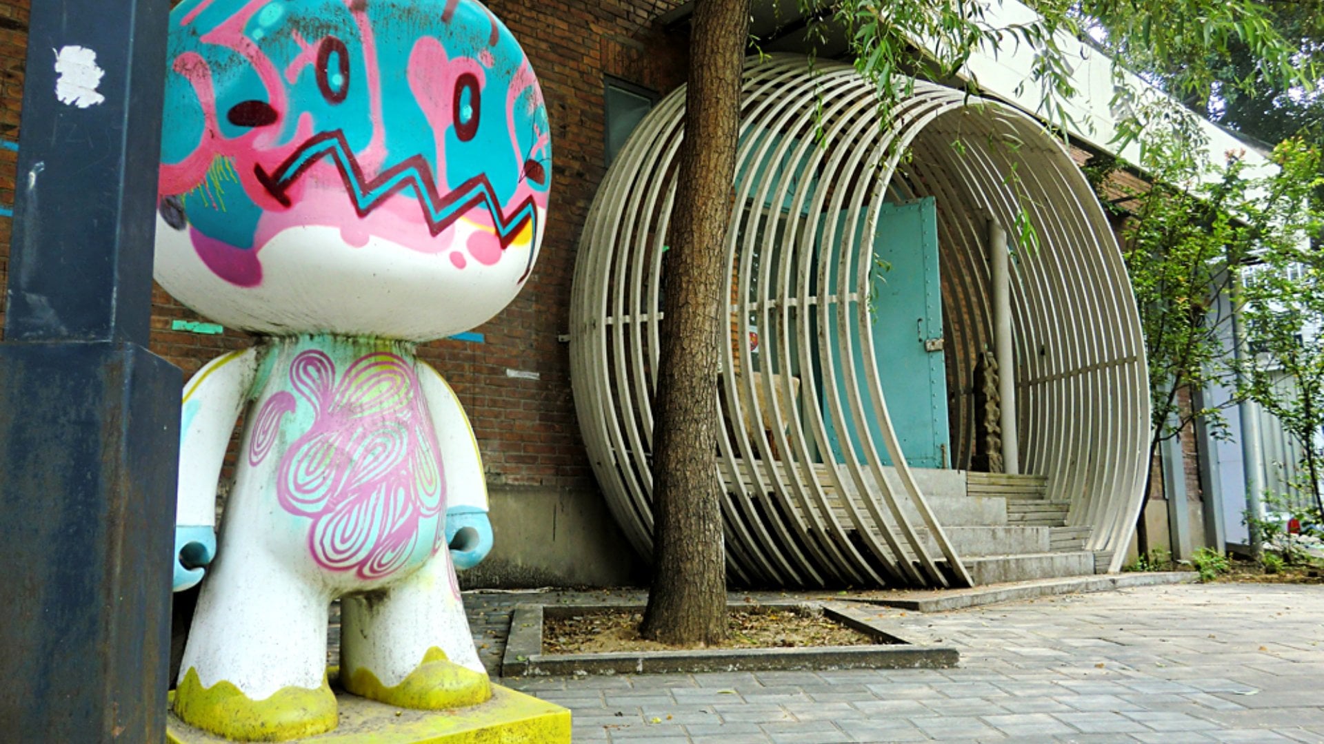 Artistic spray painted graffiti character in 798 Art District, Beijing, China