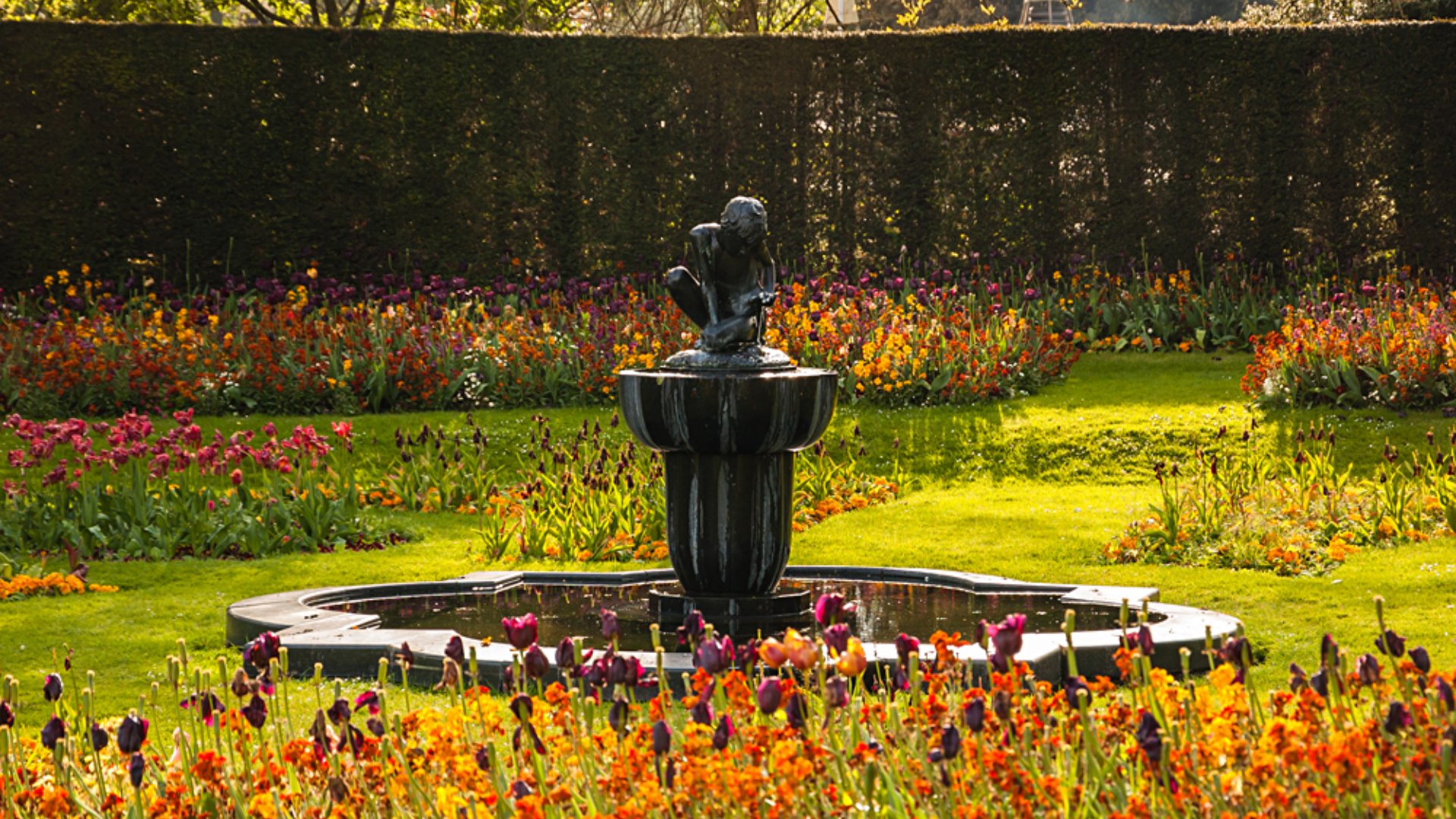 Boy and Frog Sculpture in the pond of Queen Mary's Garden in Regent's Park, London, England, UK (United Kingdom)