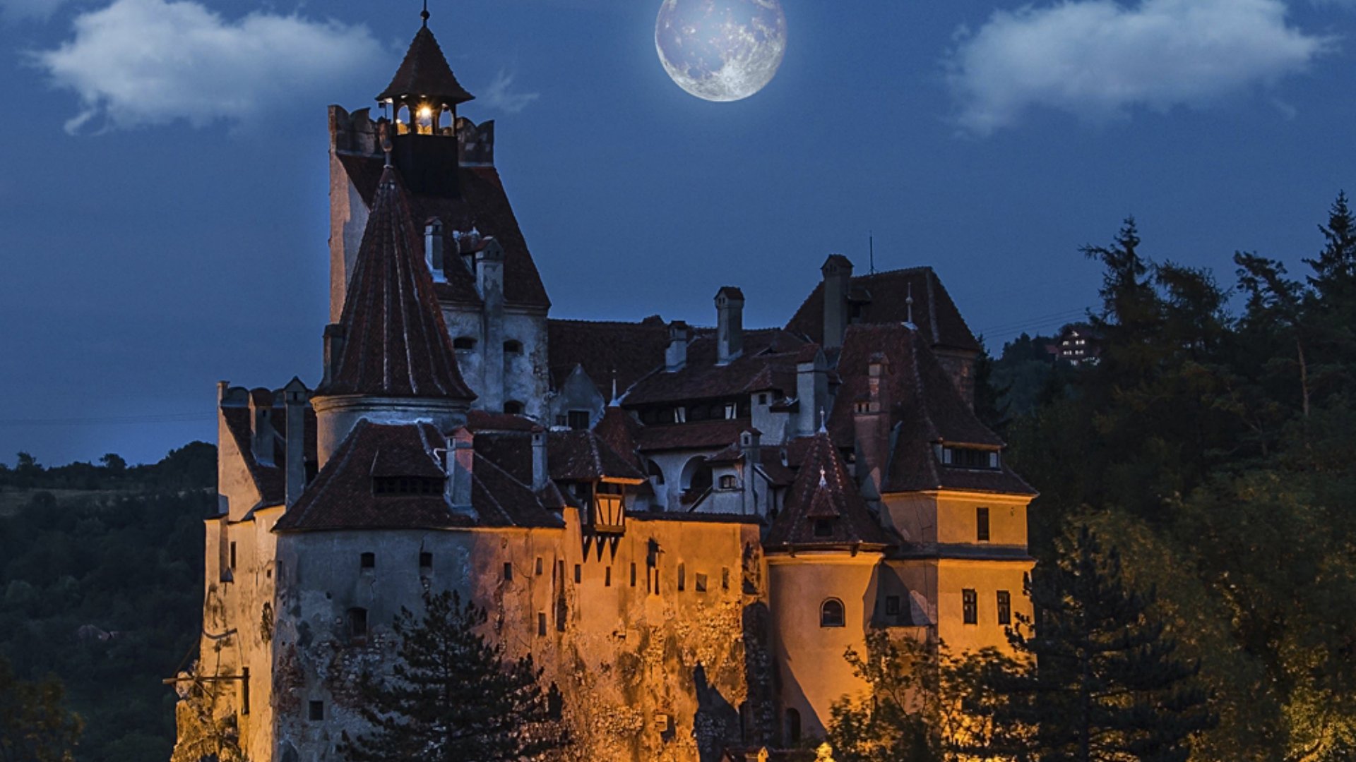 Bran Castle at Night with Full Moon, Transylvania, Romania - Cropped