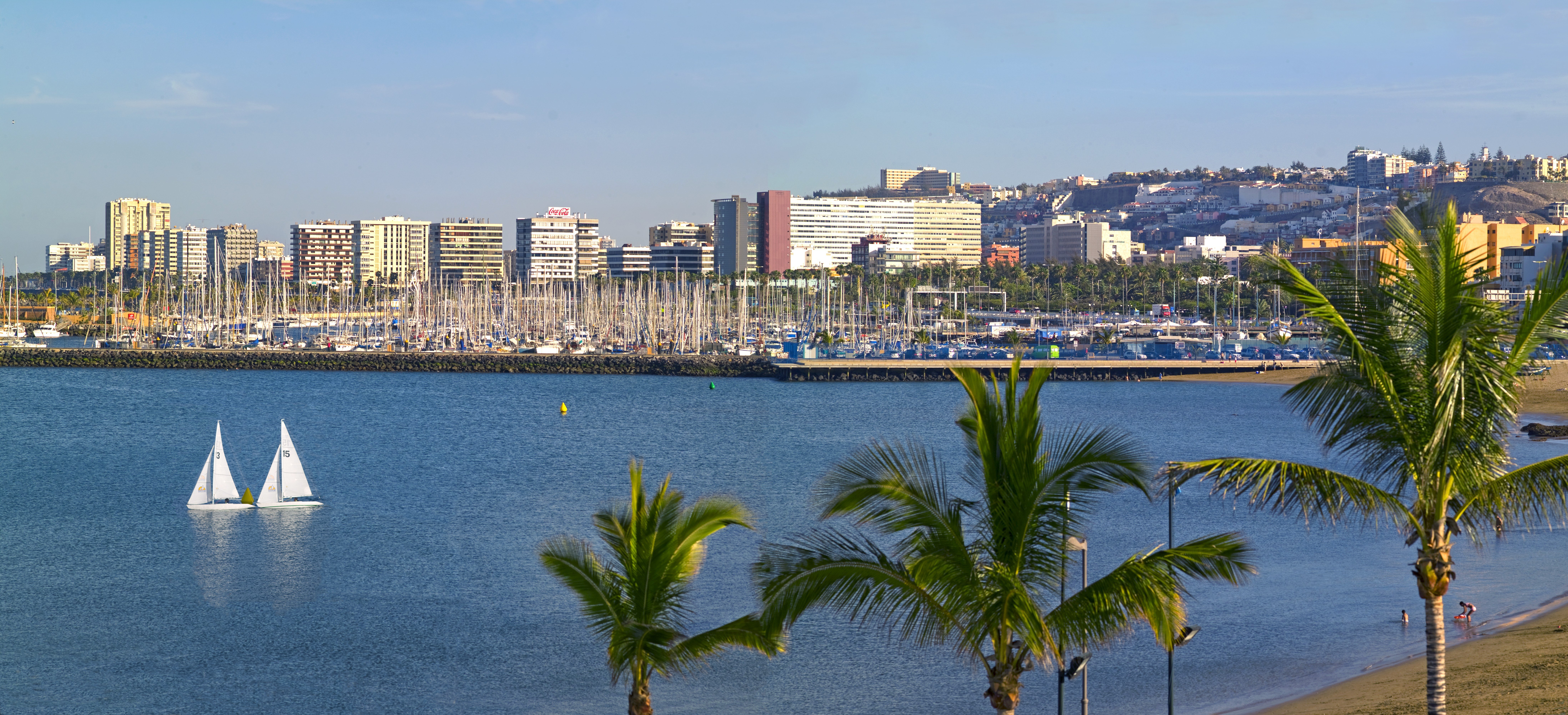 Two white sail boats on the waterfront of Las Palmas, Gran Canaria.