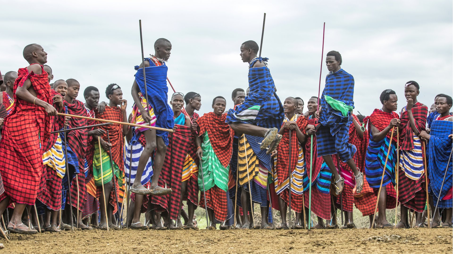 Maasai warriors chanting and jumping, highest jumpers are noticed by ladies and it is a matter of pride