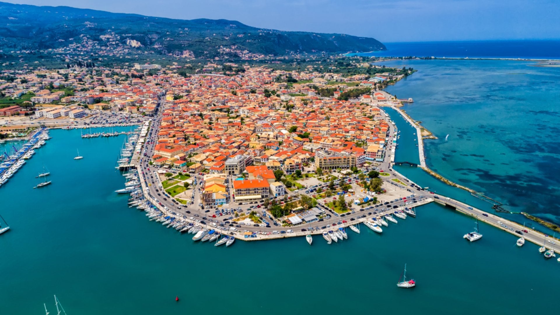 Sailboats in the marina and the city of Lefkada island, Ionian Islands, Greece