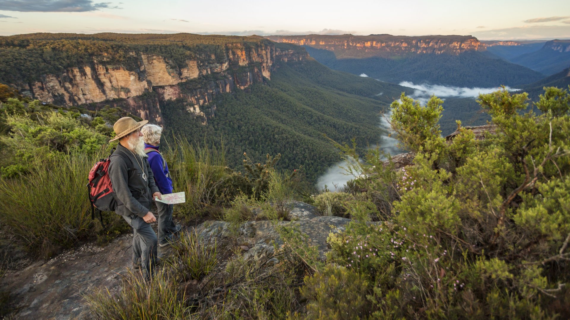 Senior Couple Looking at View While Bushwalking in Australia