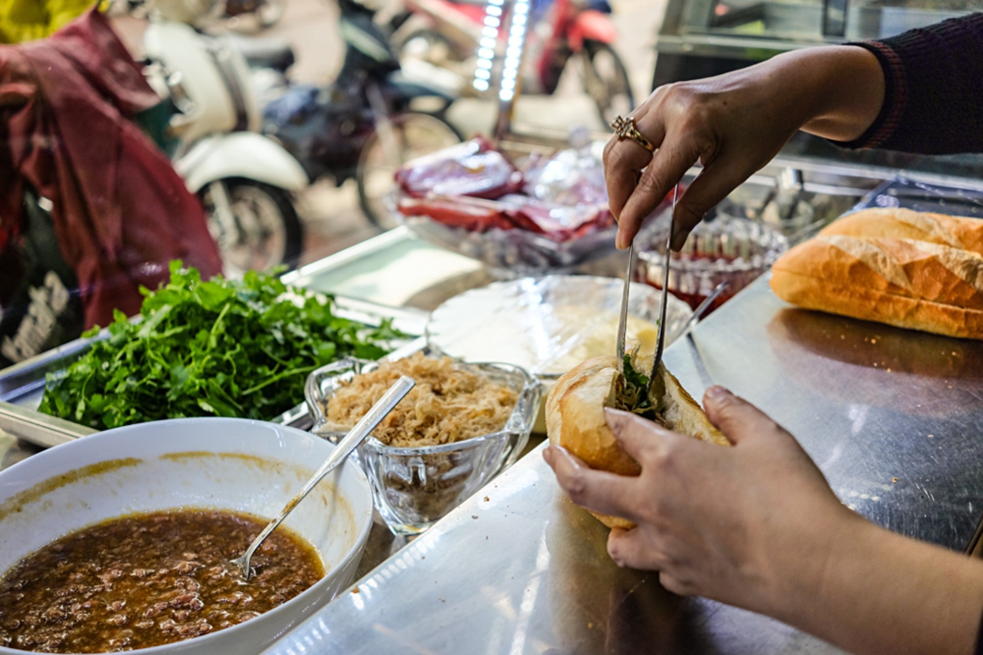 Street food vendour selling Banh Mi, Ho Chi Minh City, Vietnam