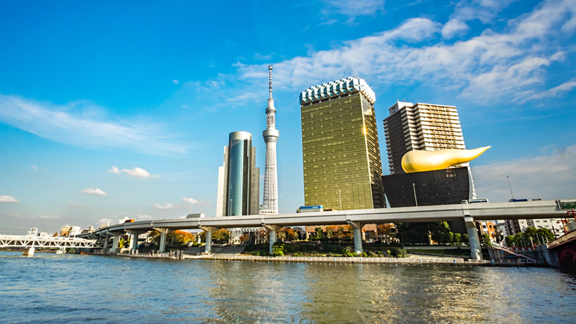 View from Sumida River of Tokyo's Sky Tree Tower and Asahi Breweries and Asahi Beer Hall, Japan