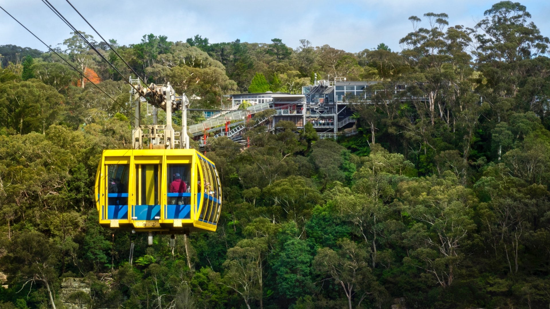 Yellow Cable-Car On Blue Mountain