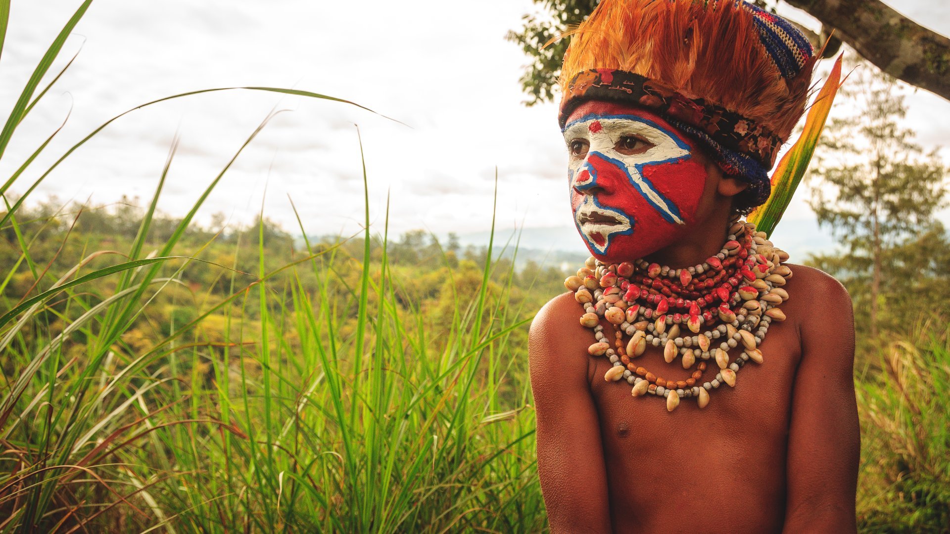 Young tribe in red paint