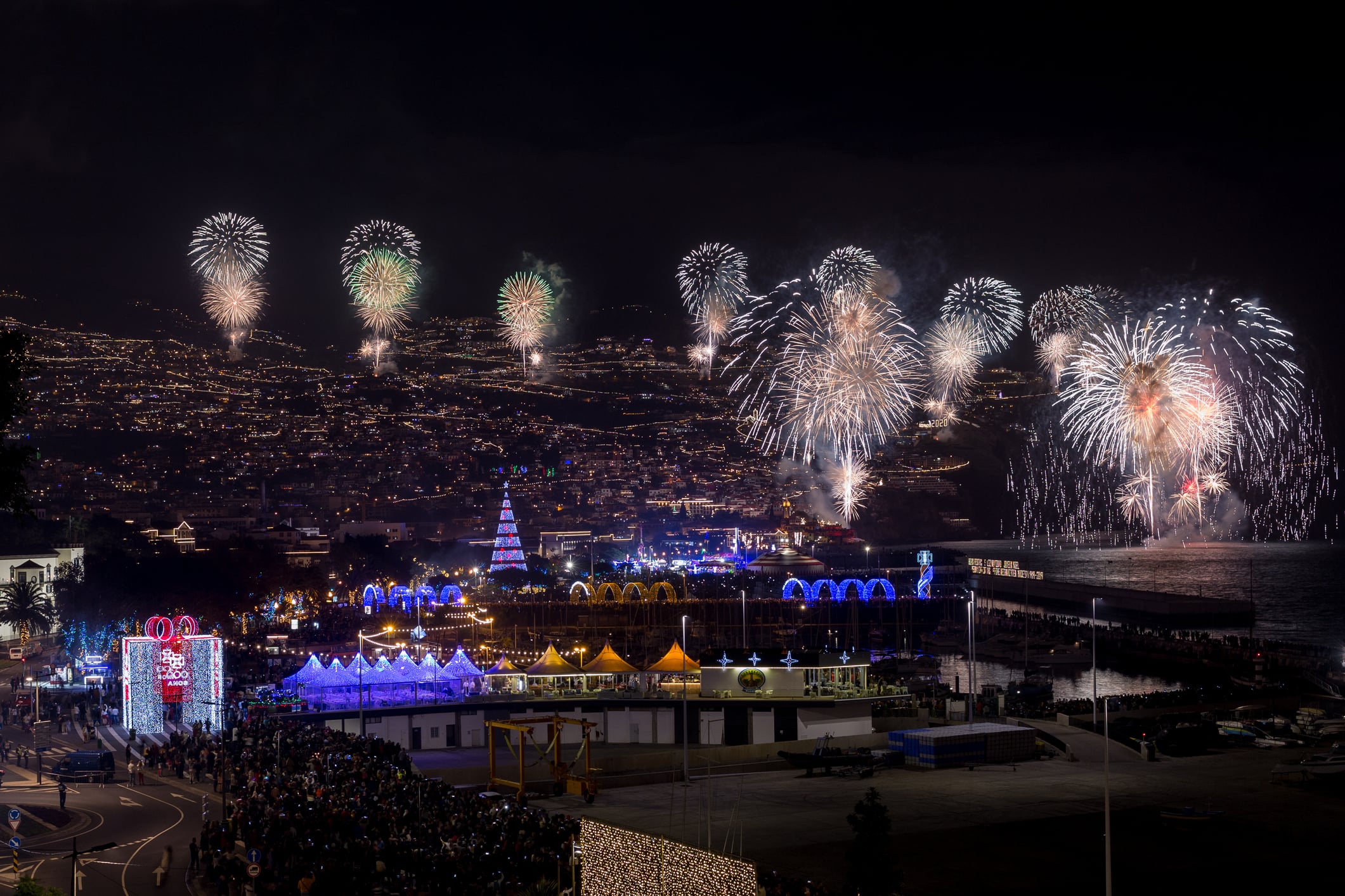 Magnificent New Year fireworks beginning of year of 2020 in Funchal city, Madeira Island, Portugal.