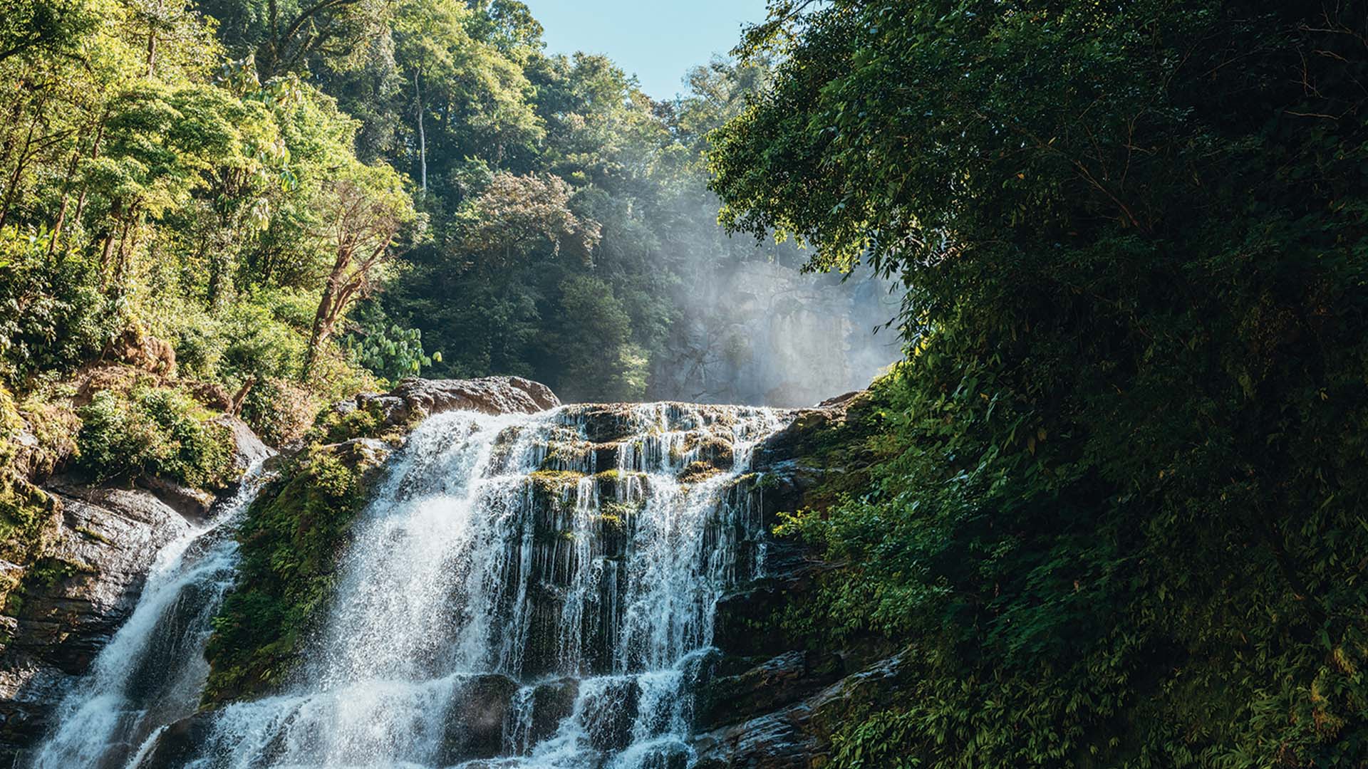 A waterfall cascading in the forest in Costa Rica
