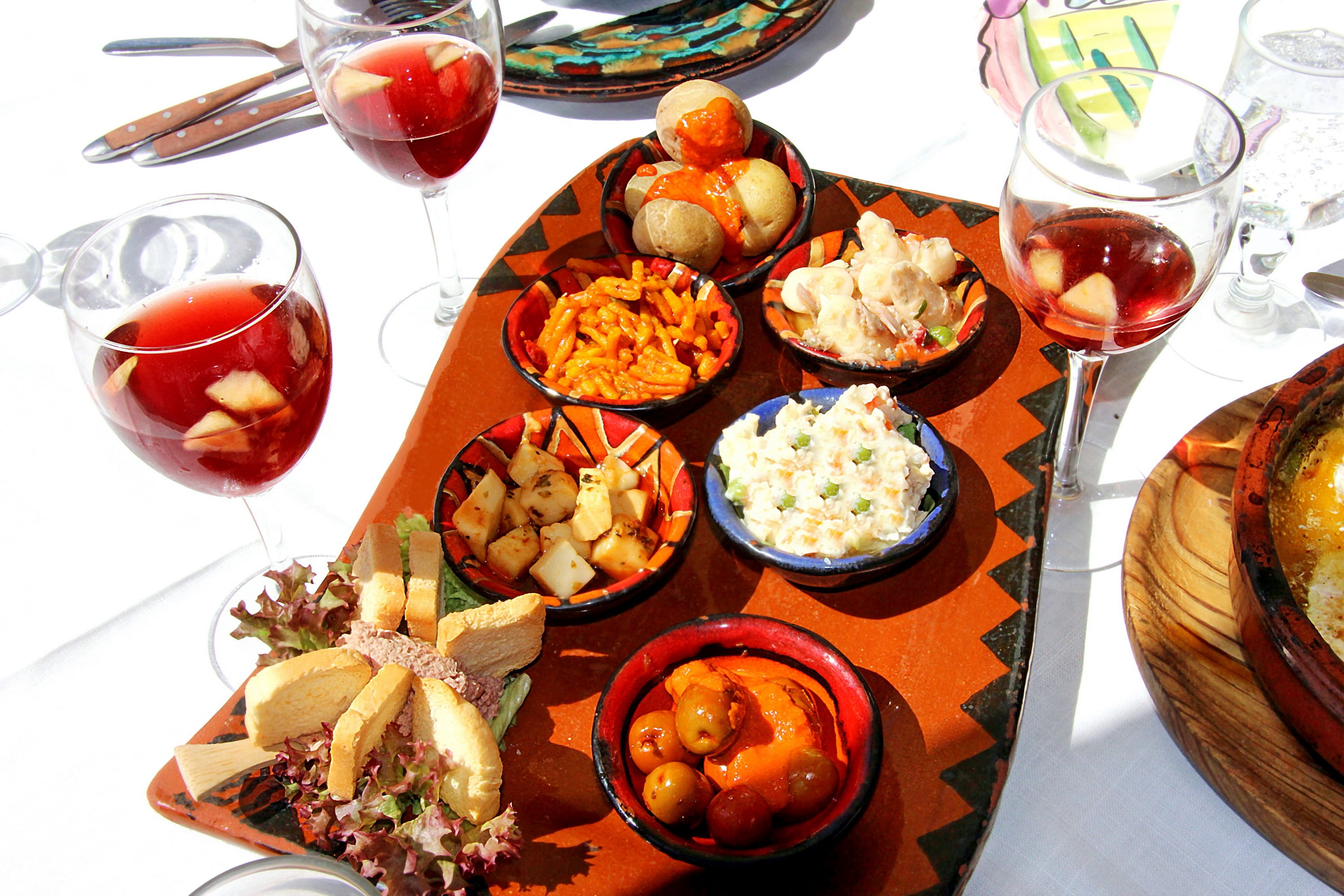 Overhead view of a spread of Spanish salads in Gran Canaria