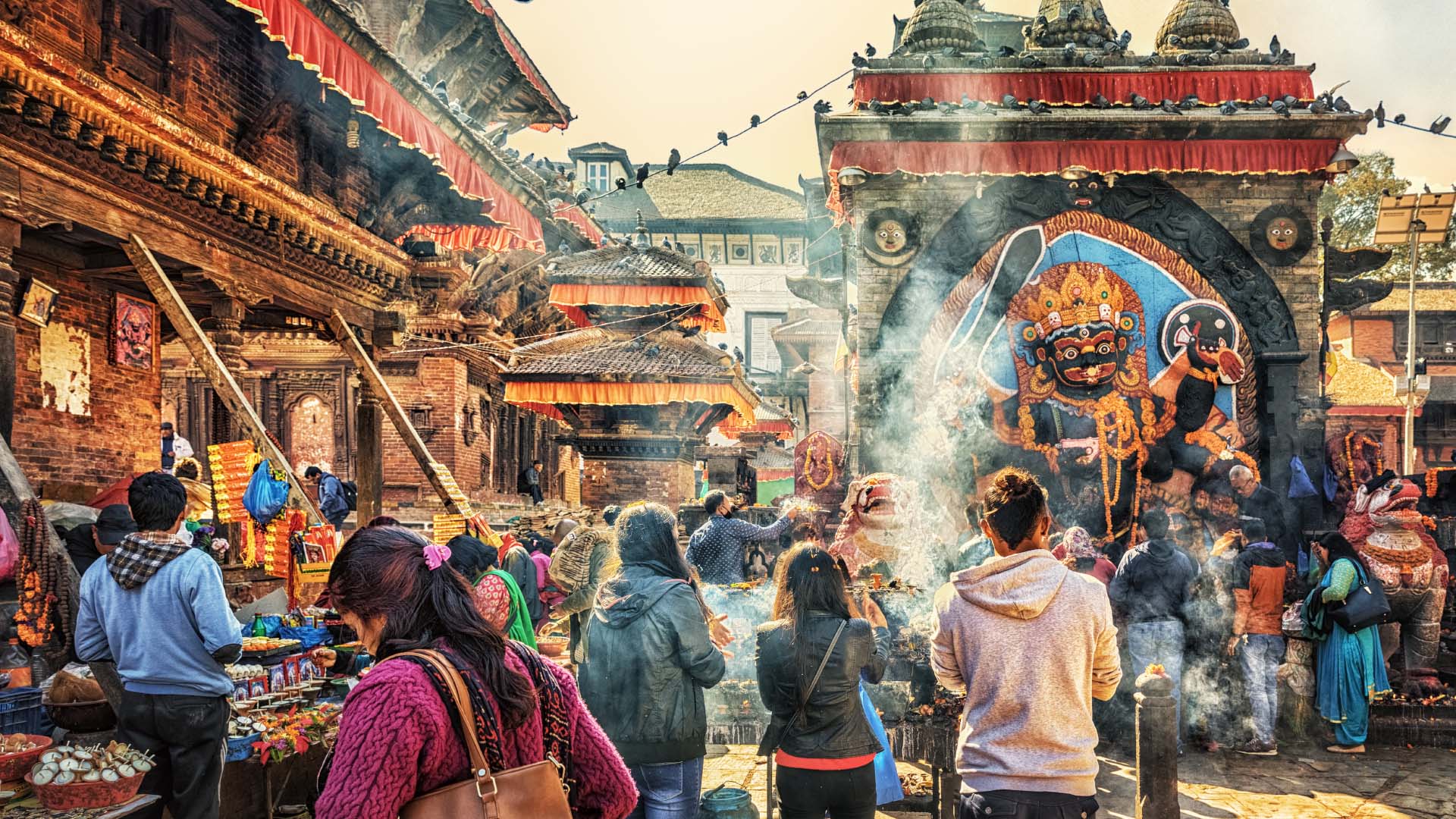 Incense and tourists in main square in Kathmandu, Nepal