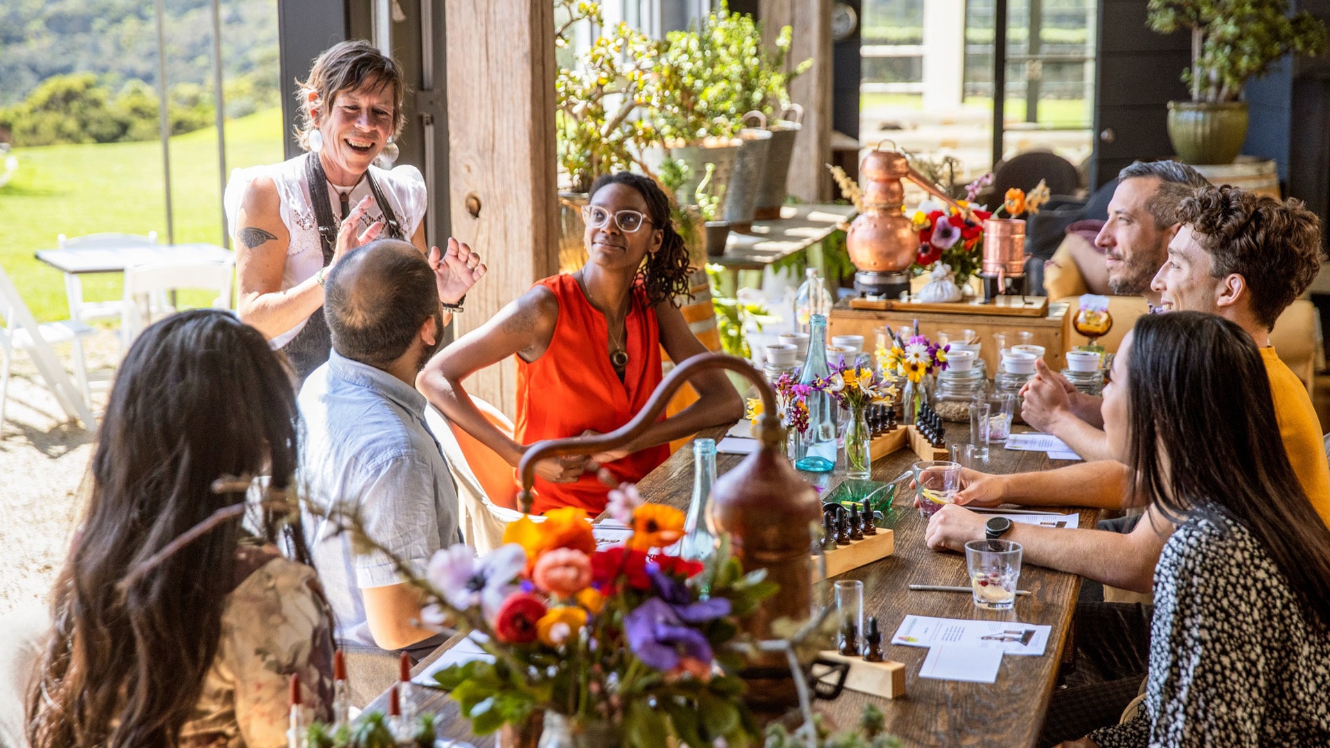 People at dinner table in distillery