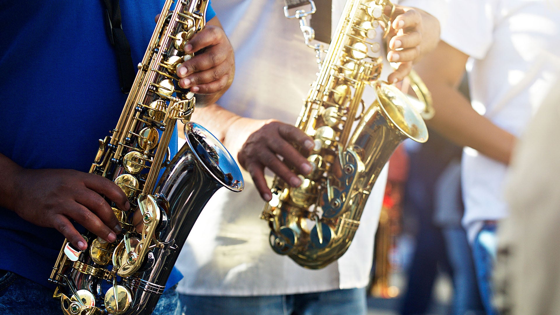 A few black musicians playing saxophone in Bo Kaap neighbourhood in Cape Town, South Africa