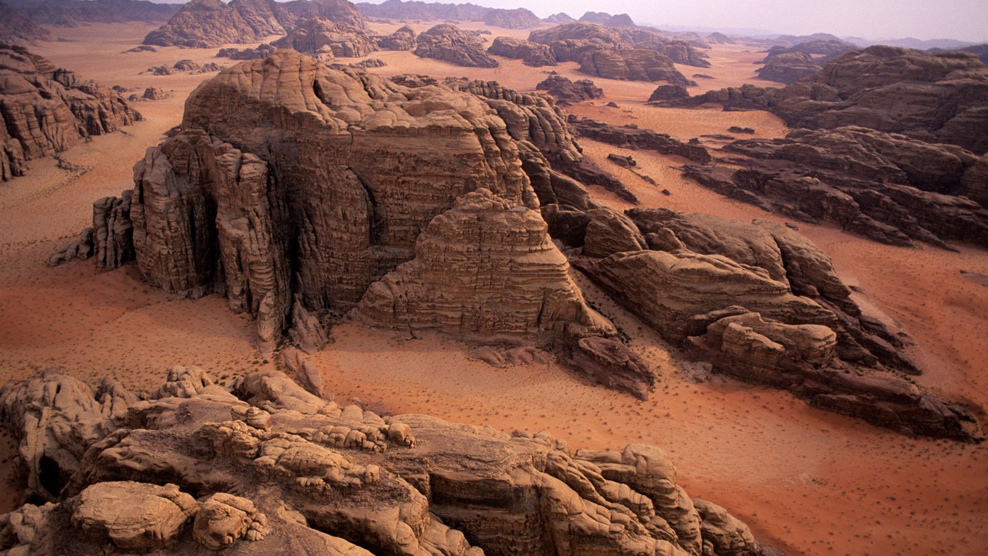 Black rocks and red sands of Wadi Rum in Jordan