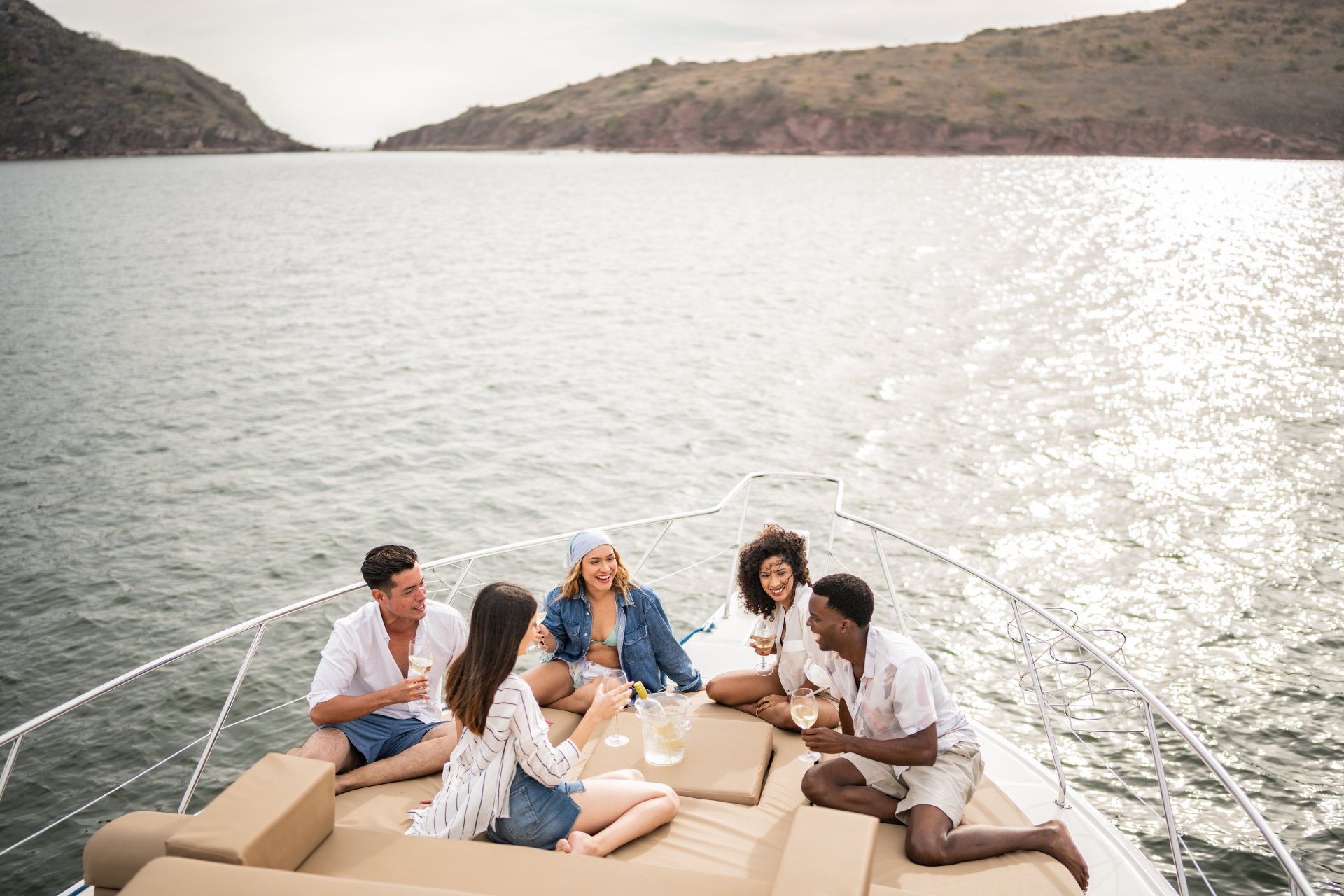 Friends lounge on a boat