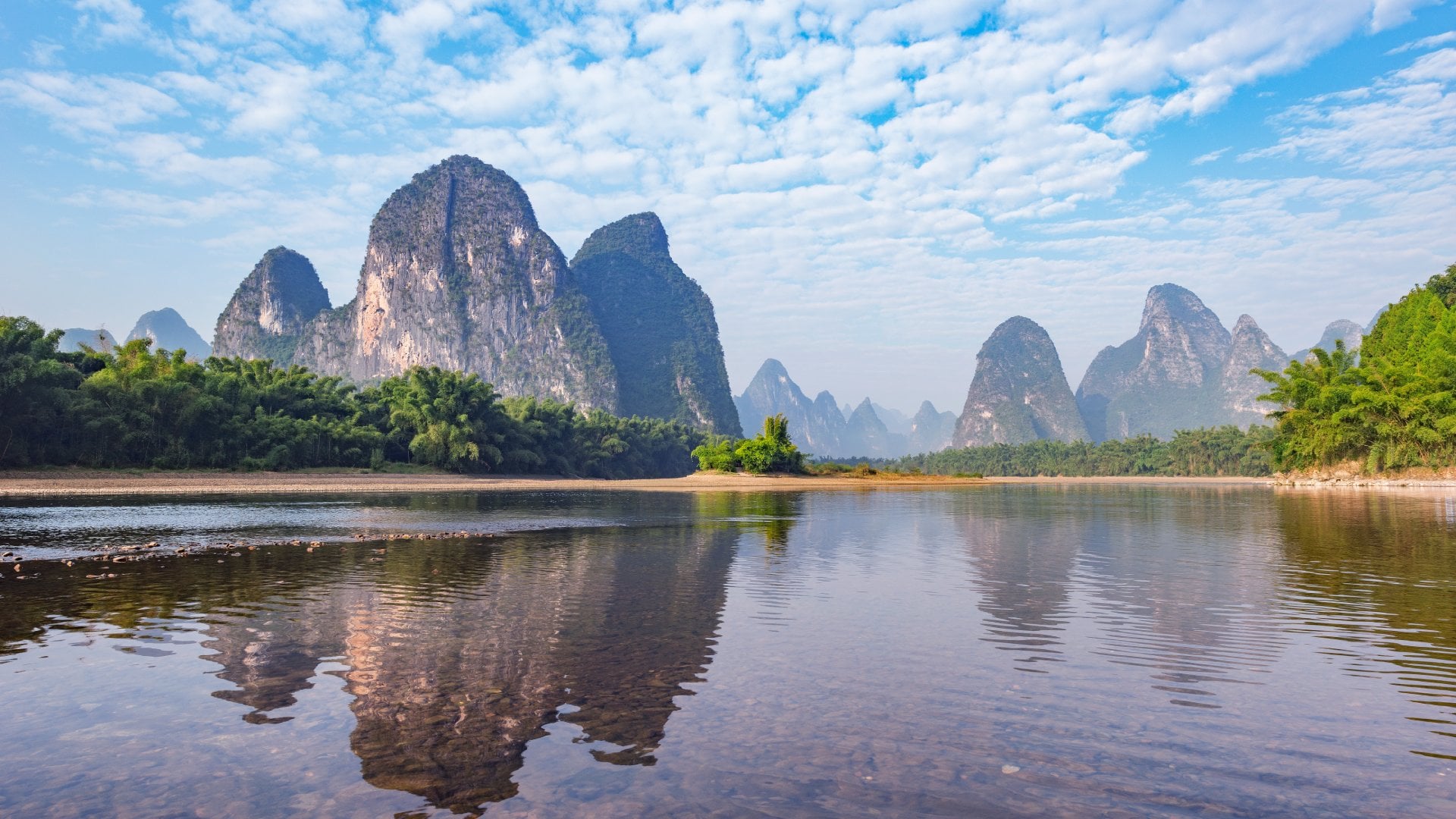 The Li River and surrounding karst mountain landscape is a great photo opportunity on all China tours. The Li River and surrounding karst mountain landscape is a great photo opportunity on all China tours.